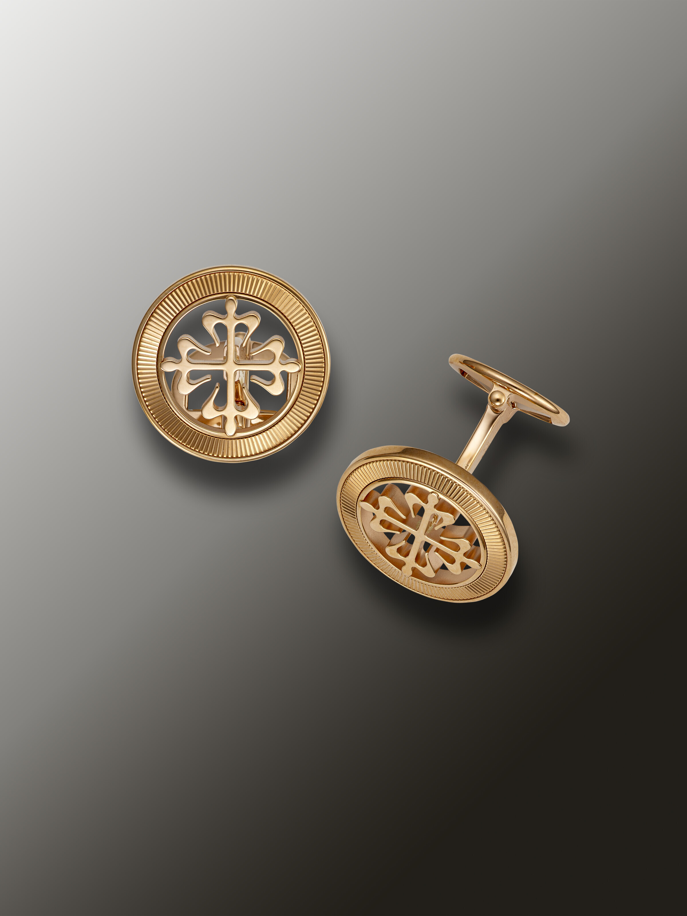 PATEK PHILIPPE, PAIR OF PINK GOLD CUFFLINKS, Christie’s