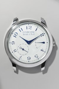 F.P. JOURNE. A RARE AND LARGE STAINLESS STEEL WALL CLOCK, SIGNED F.P ...