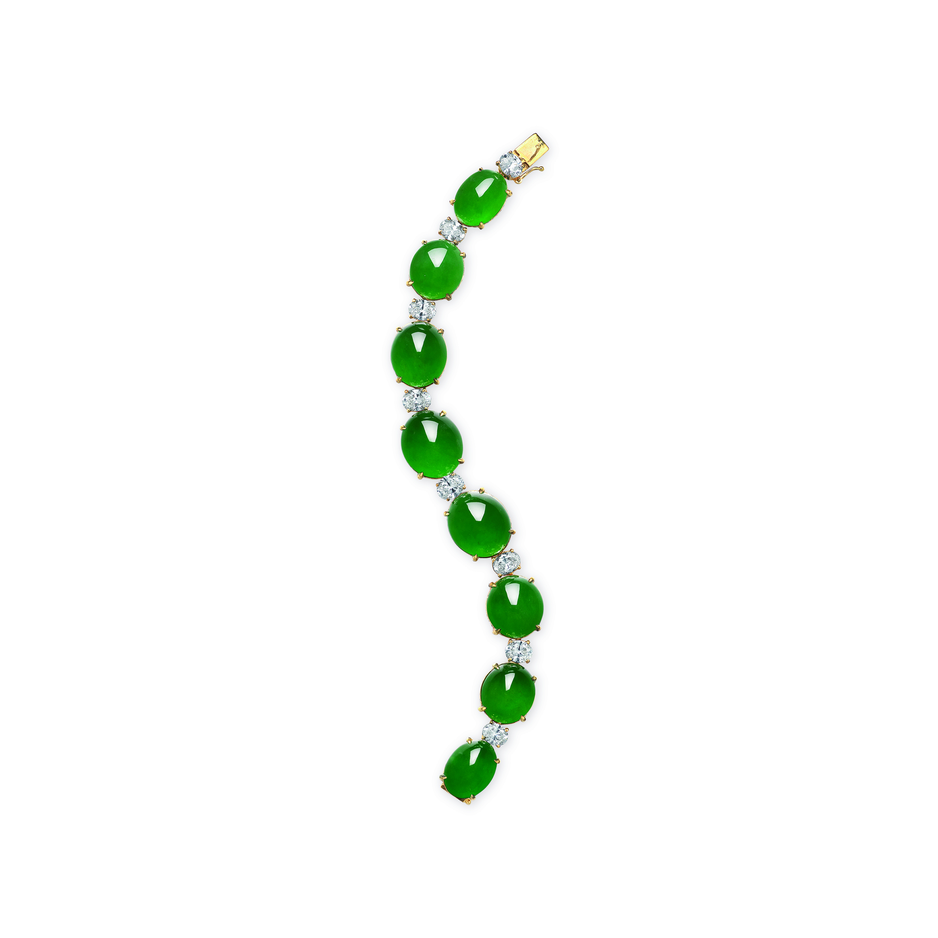 A Tamara Comolli jadeite and diamond bracelet. Eight jadeite cabochons (closed back), the largest measuring approximately 15.60 x 13.60 x 6.30 mm, round and oval-shaped diamonds, 18k yellow gold. Size/dimensions: 16.0 cm. Sold for CHF516,600 on 10 May 2023 at Christie’s in Geneva