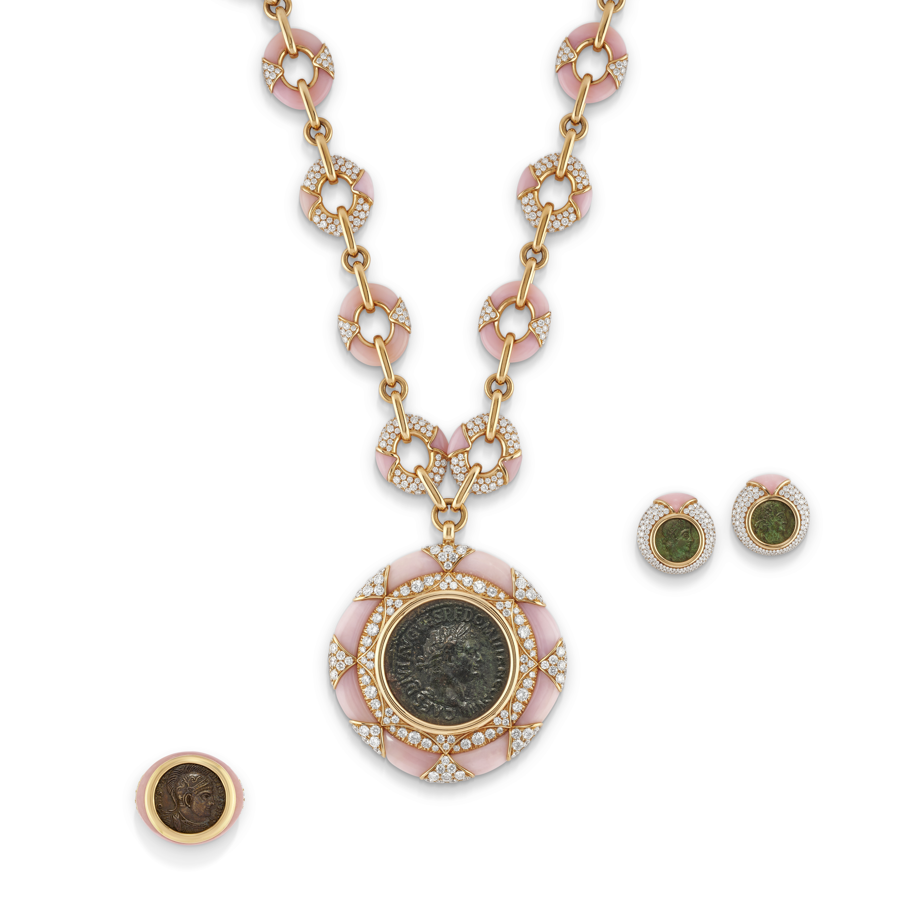 A Bulgari suite of pink opal, diamond and coin &lsquo;Monete&rsquo; jewellery. Size/dimensions: necklace 76.0 cm; pendant 7.0 x 6.3 cm; bracelet 18.0 cm; earrings 2.2 cm; US ring size 6&frac12;. Sold for CHF239,400 on 12 May 2023 at Christie’s in Geneva