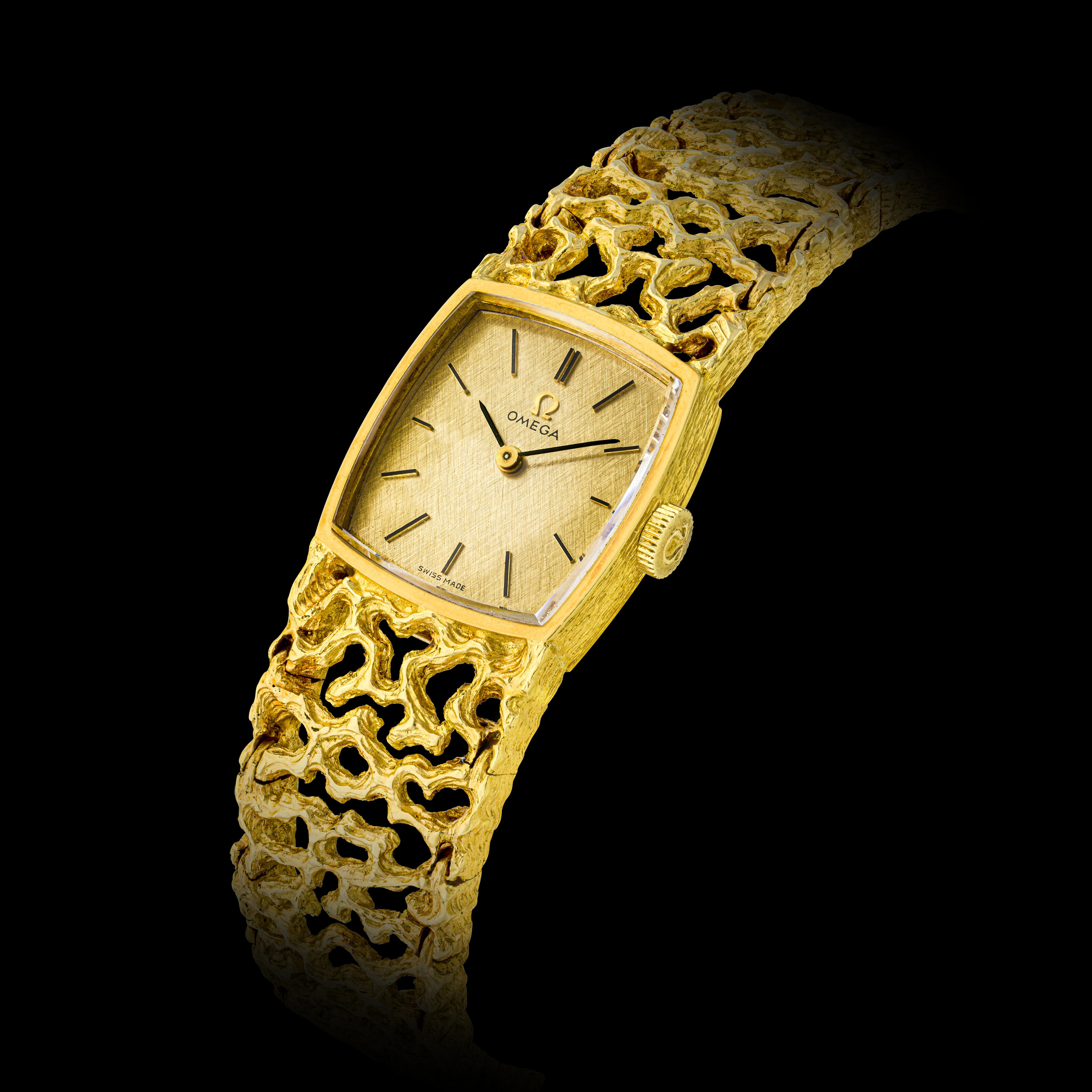 OMEGA, A LADY’S 18K GOLD BRACELET WATCH, Christie’s