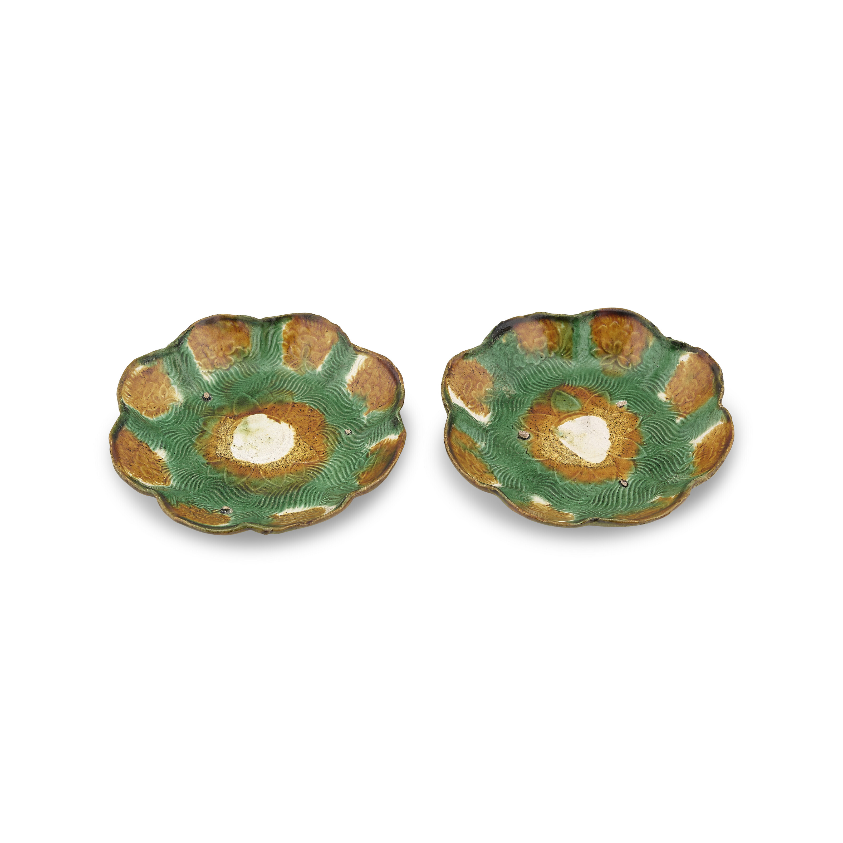 中国　遼三彩 遼三彩模印花口盤一對, LIAO DYNASTY (907-1125) | Christie's