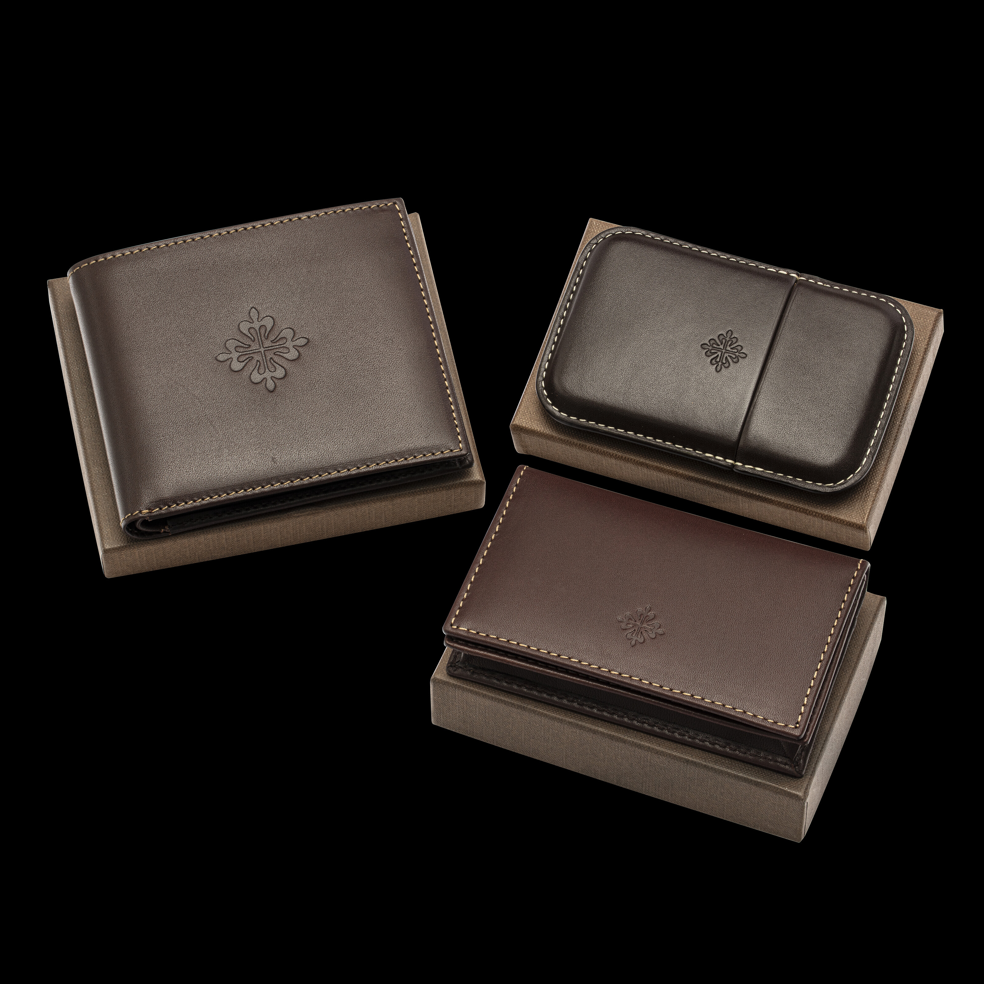 PATEK PHILIPPE TWO WALLETS AND A CARDHOLDER Christie s