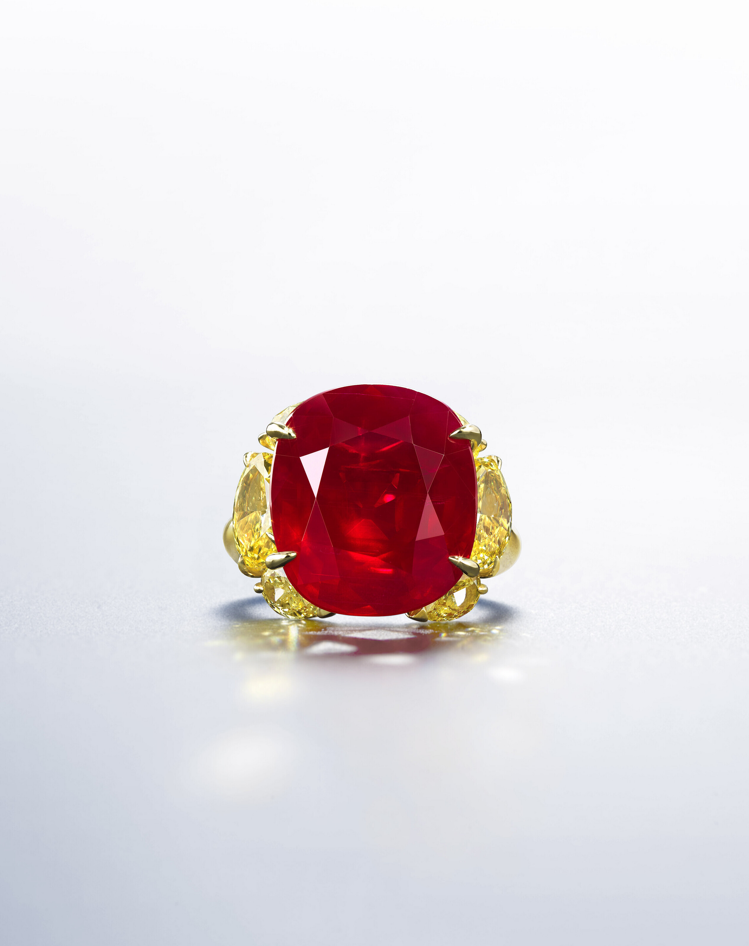 THE MYTHIC RUBYA MAGNIFICENT RUBY AND COLOURED DIAMOND RING