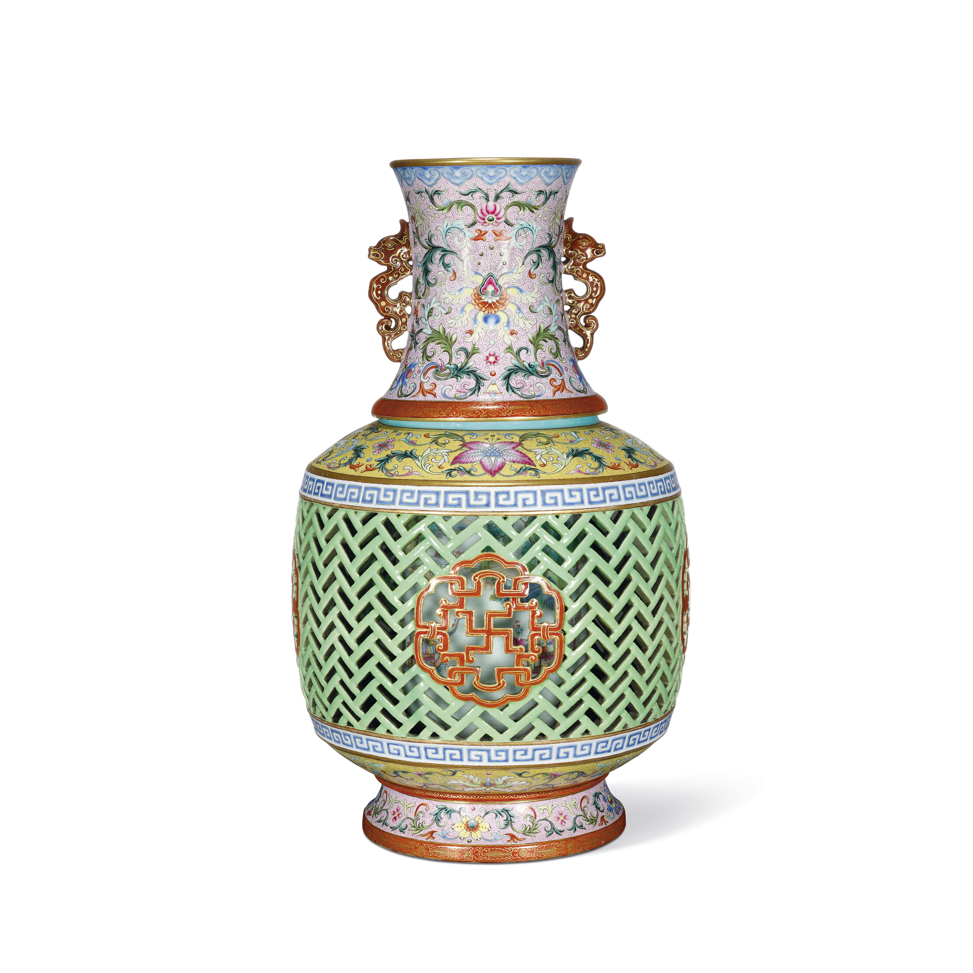 A MAGNIFICENT YANGCAI RETICULATED AND ROTATING &lsquo;DRAGON BOAT&rsquo; VASE. QIANLONG SIX-CHARACTER SEAL MARK IN UNDERGLAZE BLUE AND OF THE PERIOD (1736-1795). 15 3/4 in. (40 cm.) high. Estimate: HK$20,000,000 &ndash; 30,000,000. Offered in The Imperial Palette - Three Qianlong Treasures on 30 May 2023 at Christie&rsquo;s in Hong Kong