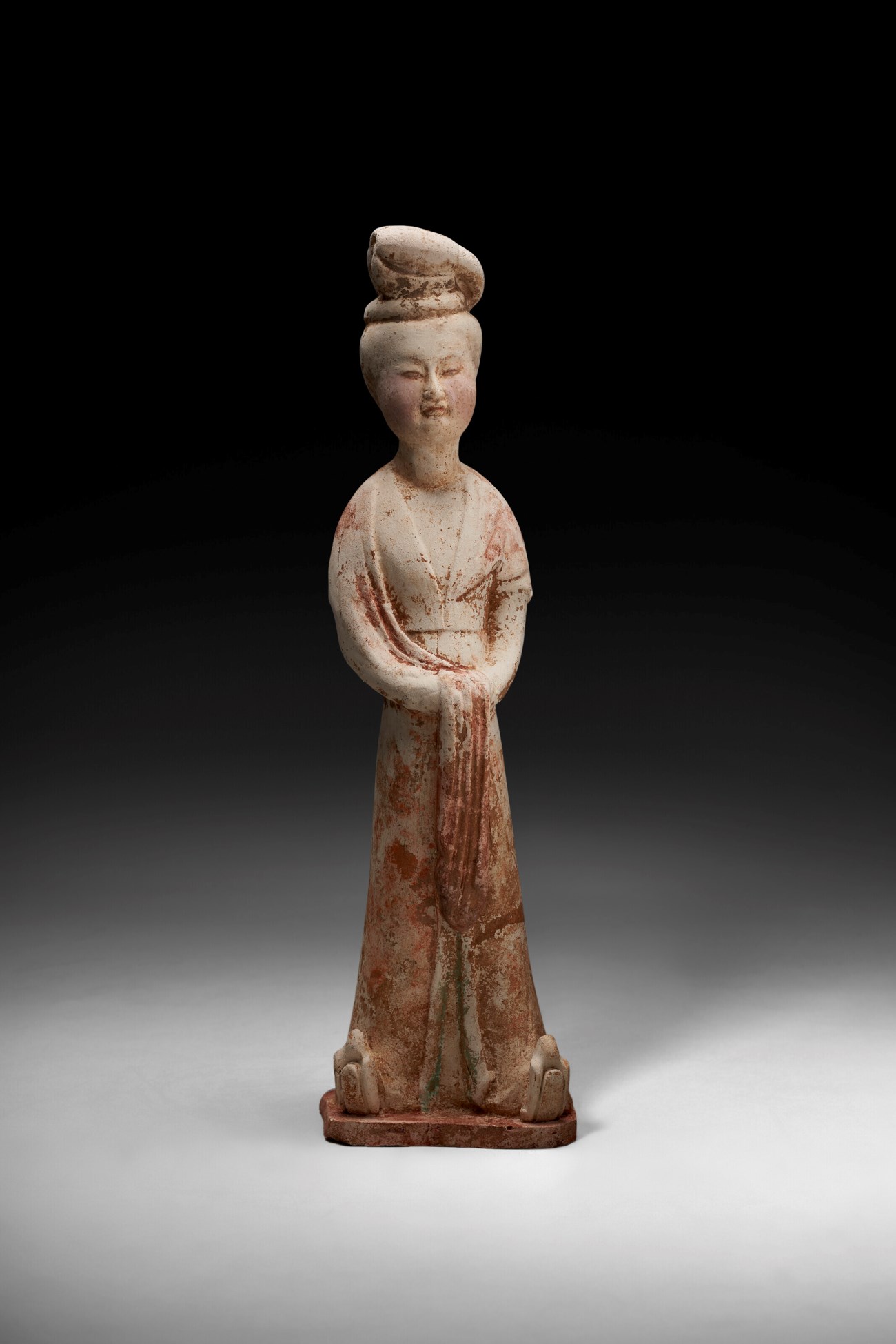 A PAINTED POTTERY FIGURE OF A COURT LADY, TANG DYNASTY (AD 618 -907 ...
