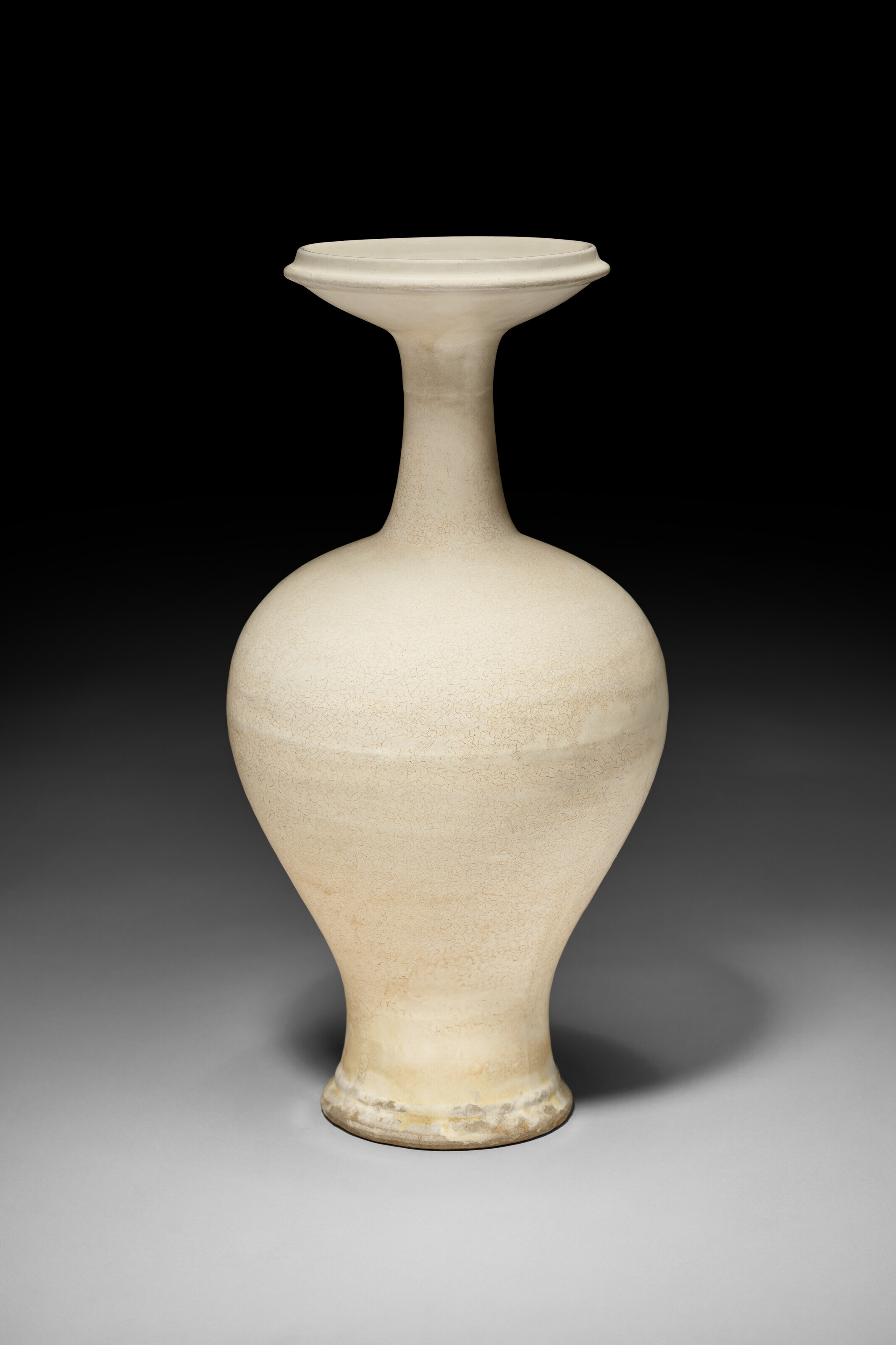 A RARE GLAZED WHITE PORCELAIN GOURD-FORM EWER, FIVE DYNASTIES-NORTHERN ...