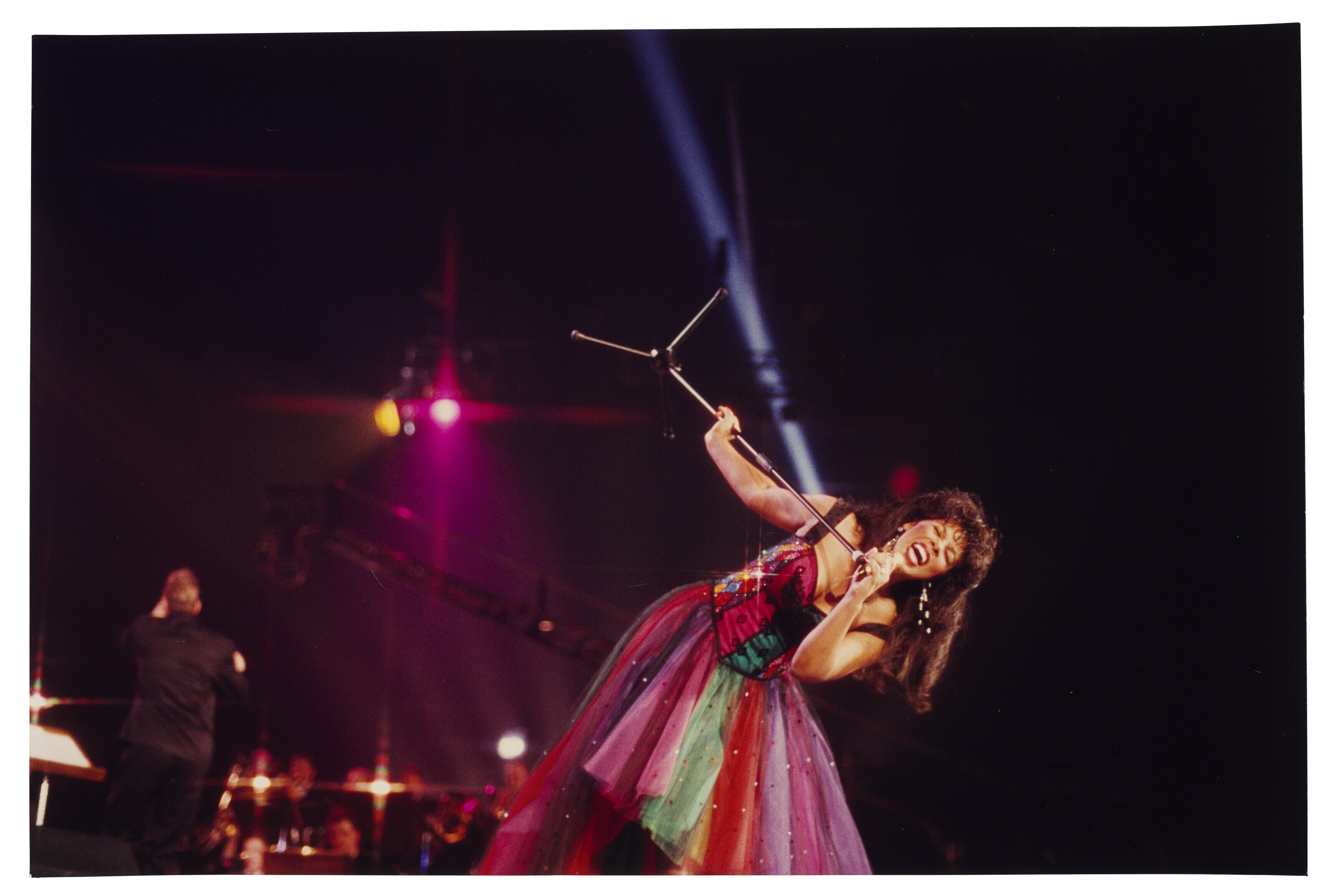 Photograph of Donna Summer on stage, c. 1995. 11 7⁄8 x 18 in (30.1 x 45.5 cm). Sold for $2,142 on 29 June 2023 at Christie’s Online