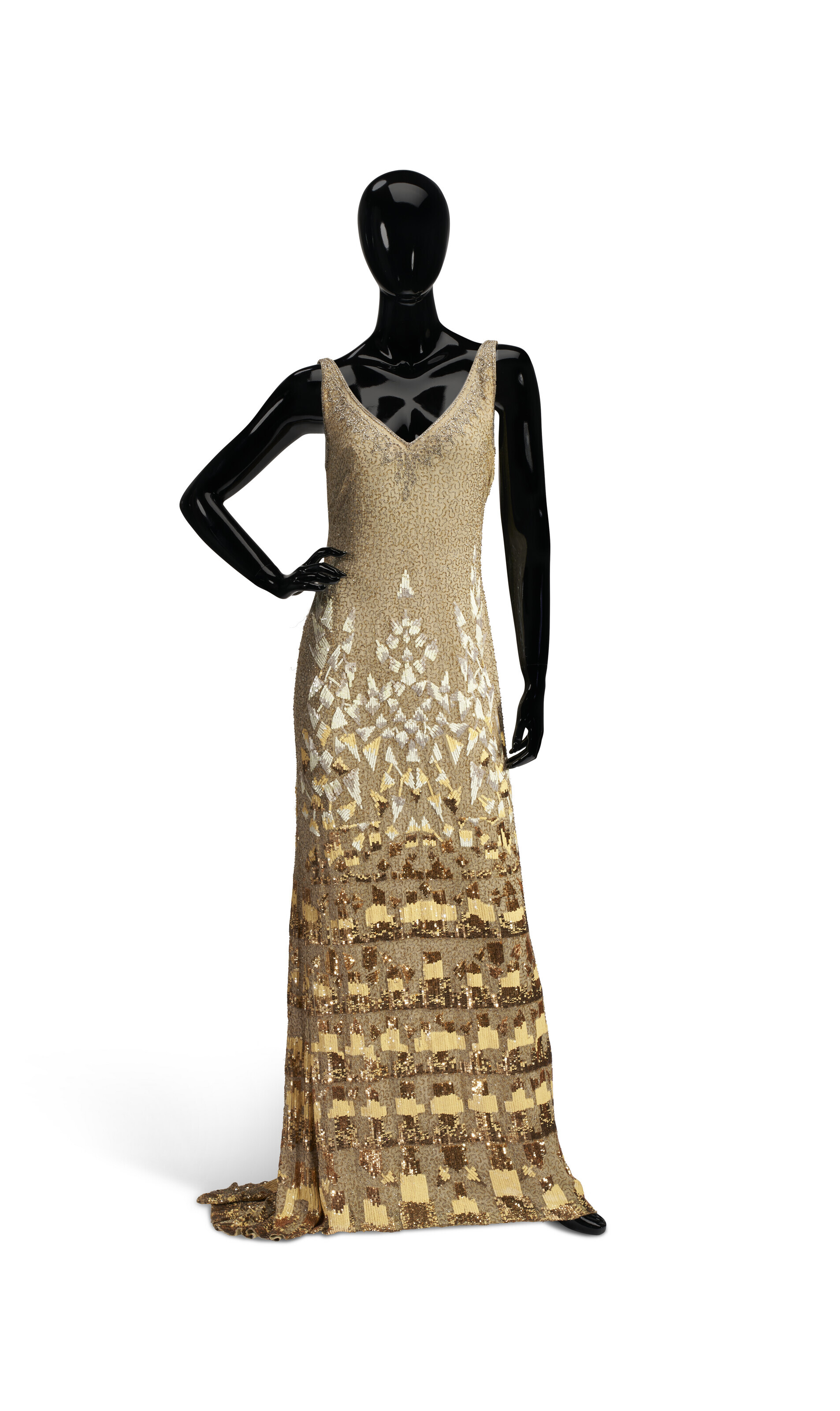 A CREAM PONGEE SILK EVENING DRESS WITH WHITE AND GOLD SEQUIN AND BEAD  DETAILS, CIRCA 2000 | Christie's