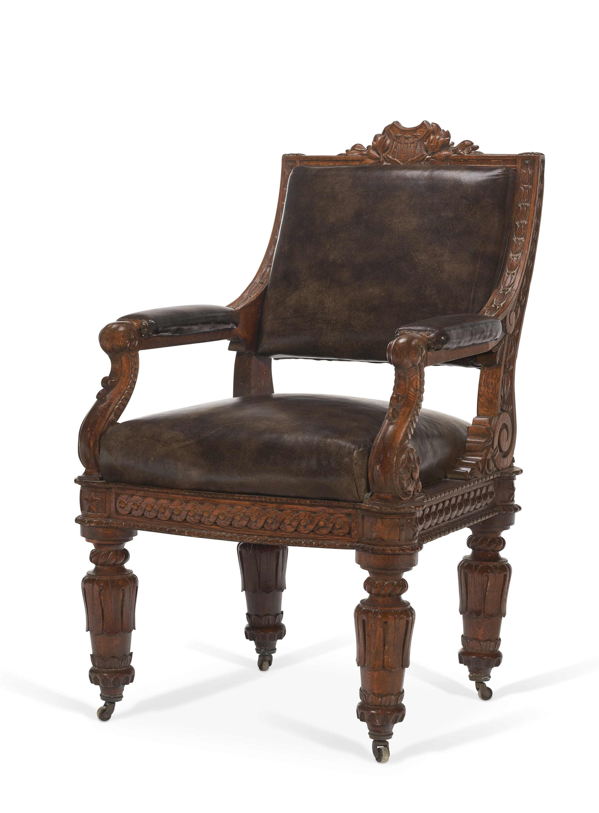 A Renaissance Revival carved oak 'United States House of Representatives' armchair, attributed to Bembe and Kimmel, New York, circa 1857. Estimate: $5,000-10,000. Offered in Important Americana on 20 January 2023 at Christie&rsquo;s in New York
