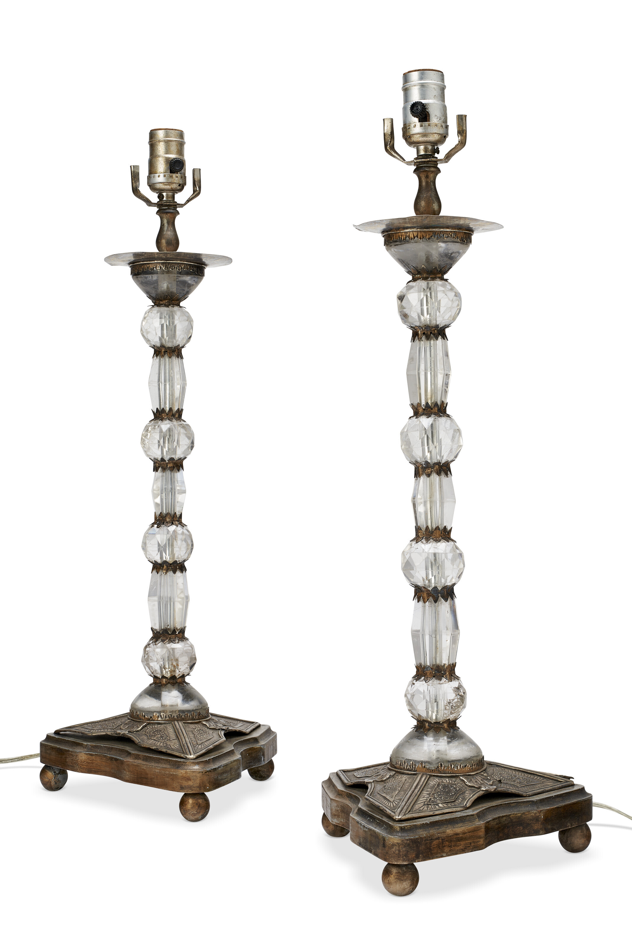 A PAIR OF ROCK CRYSTAL AND SILVERED-METAL CANDLESTICKS, NOW