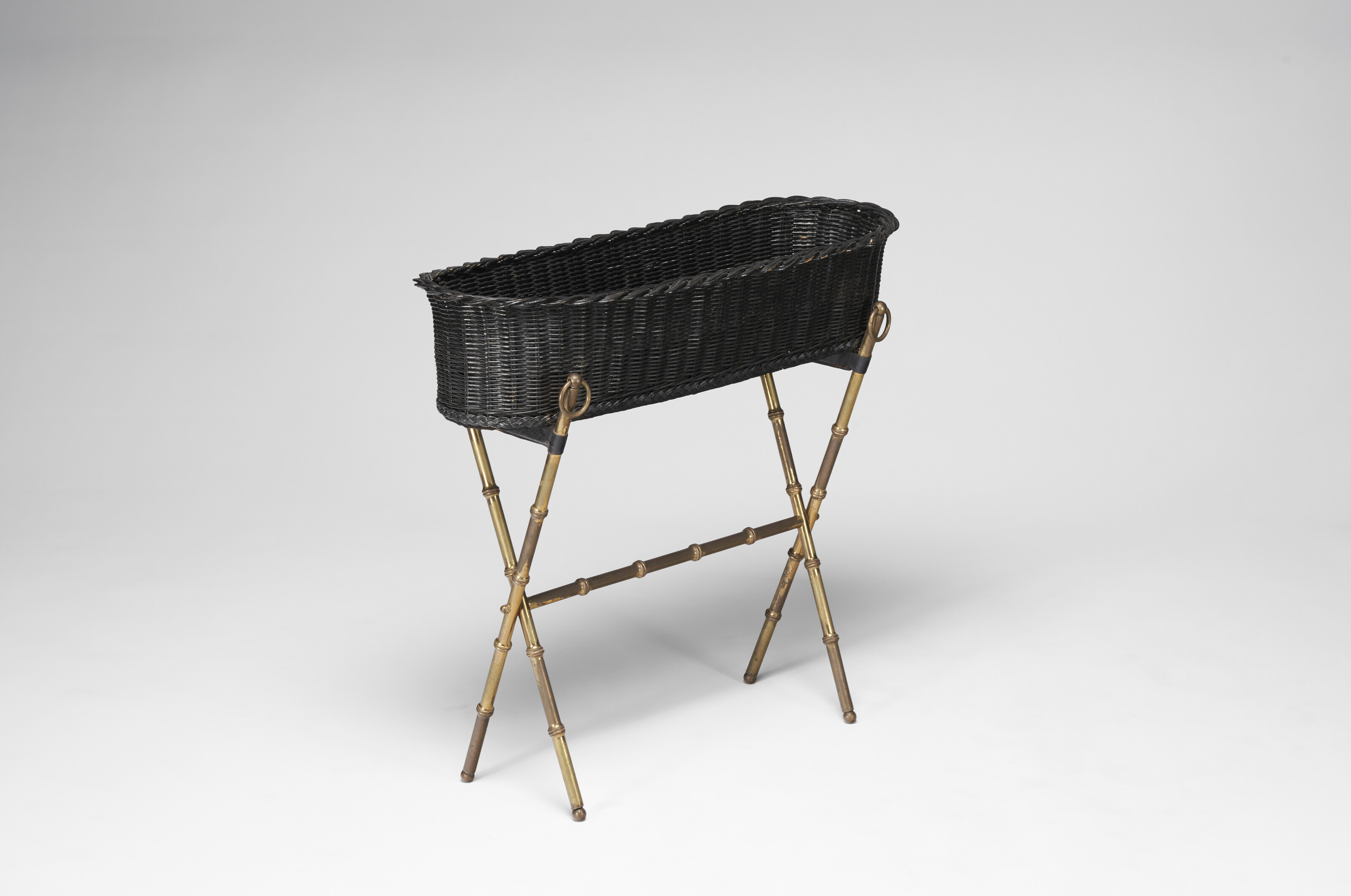 Catalog image of Bamboo Style Planter with Rattan Basket, circa 1955