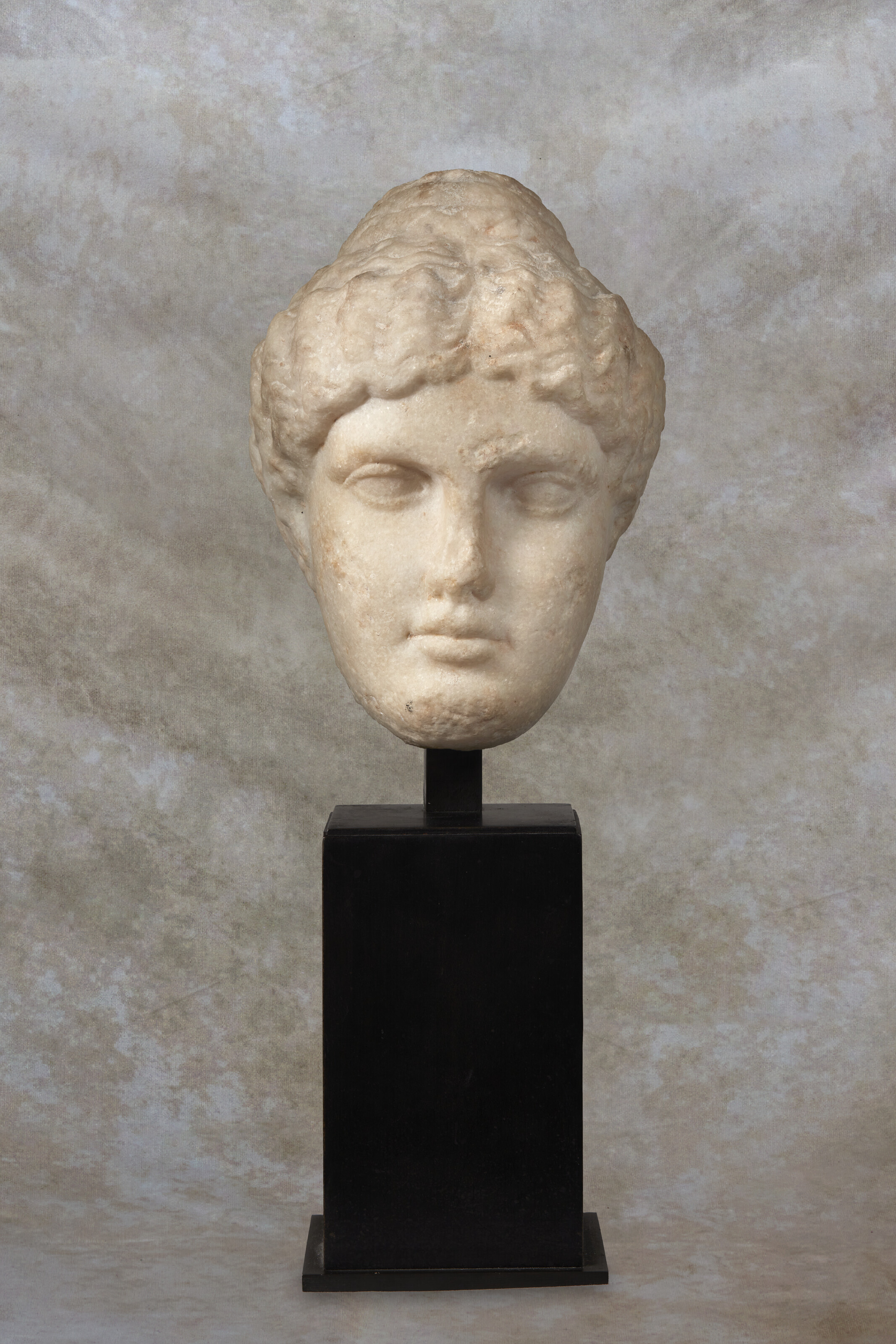 A ROMAN MARBLE PORTRAIT HEAD OF A PHILOSOPHER, CIRCA 1ST-2ND