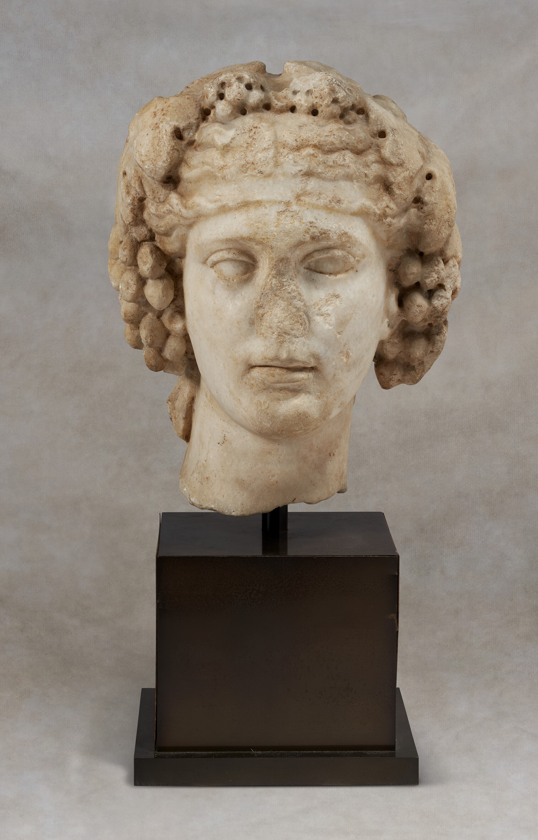 A ROMAN MARBLE PORTRAIT HEAD OF A PHILOSOPHER, CIRCA 1ST-2ND