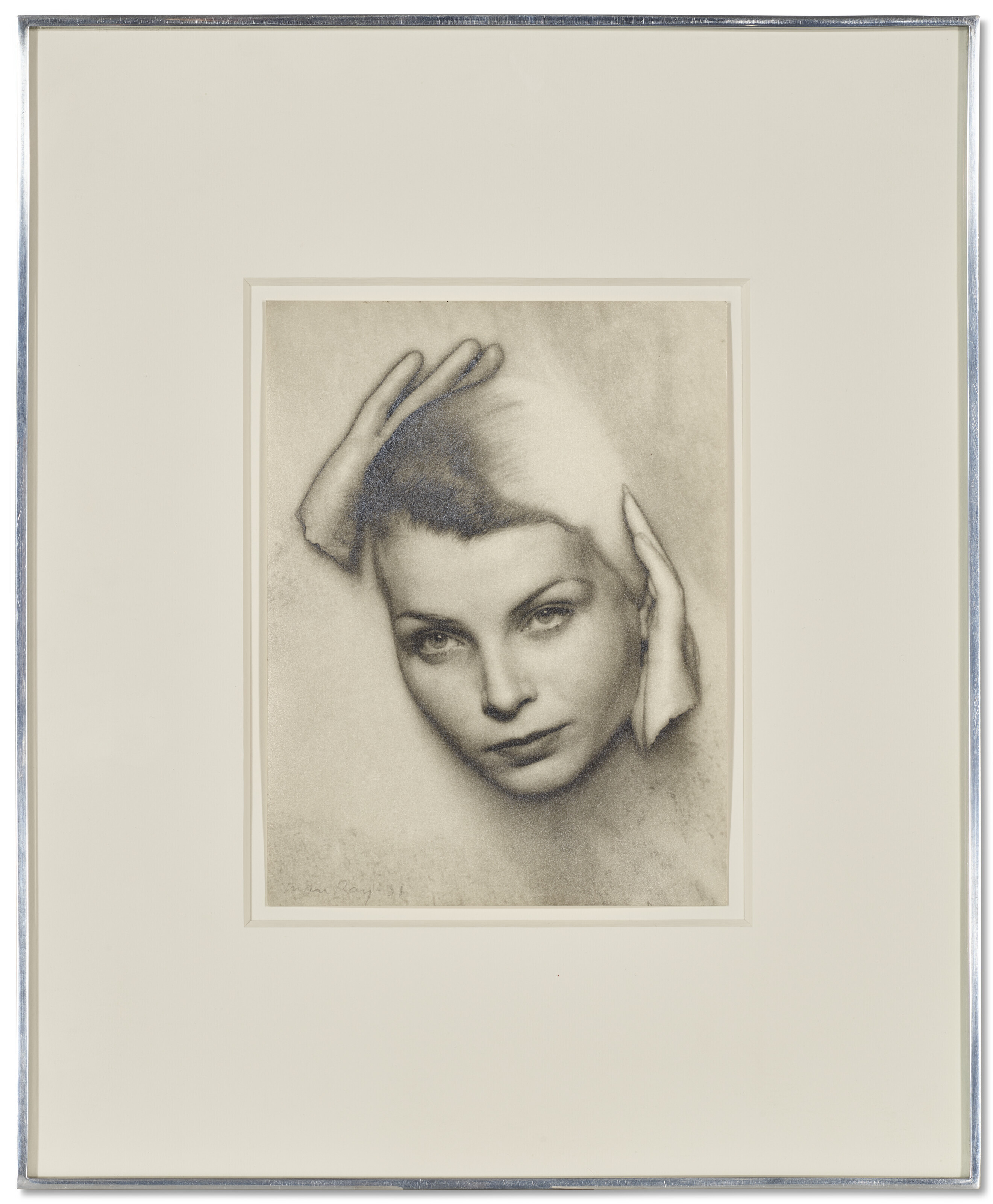 MAN RAY (1890–1976), Solarized Portrait of Mary Gill, 1931