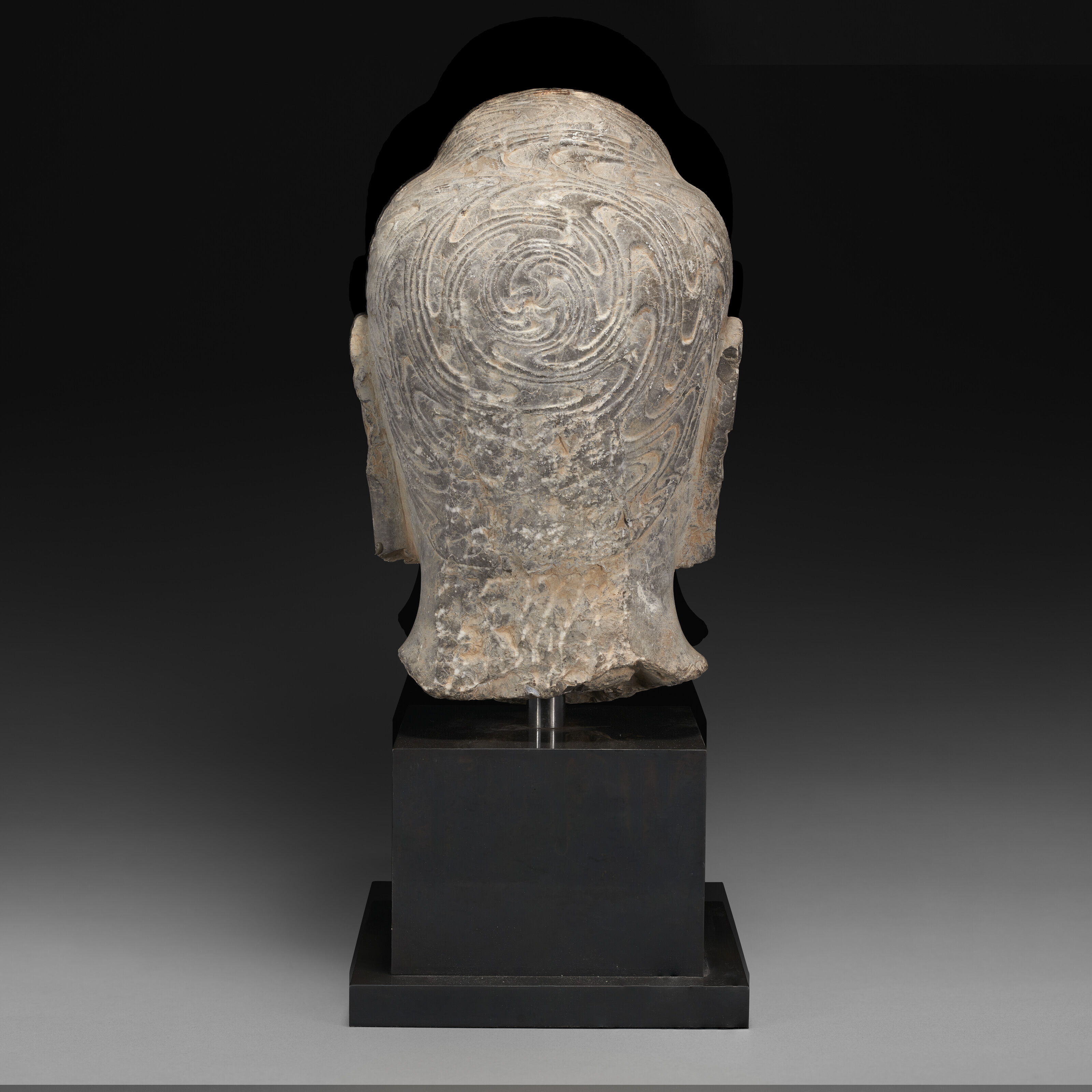 A LARGE GREY STONE HEAD OF BUDDHA, NORTHERN WEI-NORTHERN QI DYNASTY, 6TH  CENTURY | Christie's