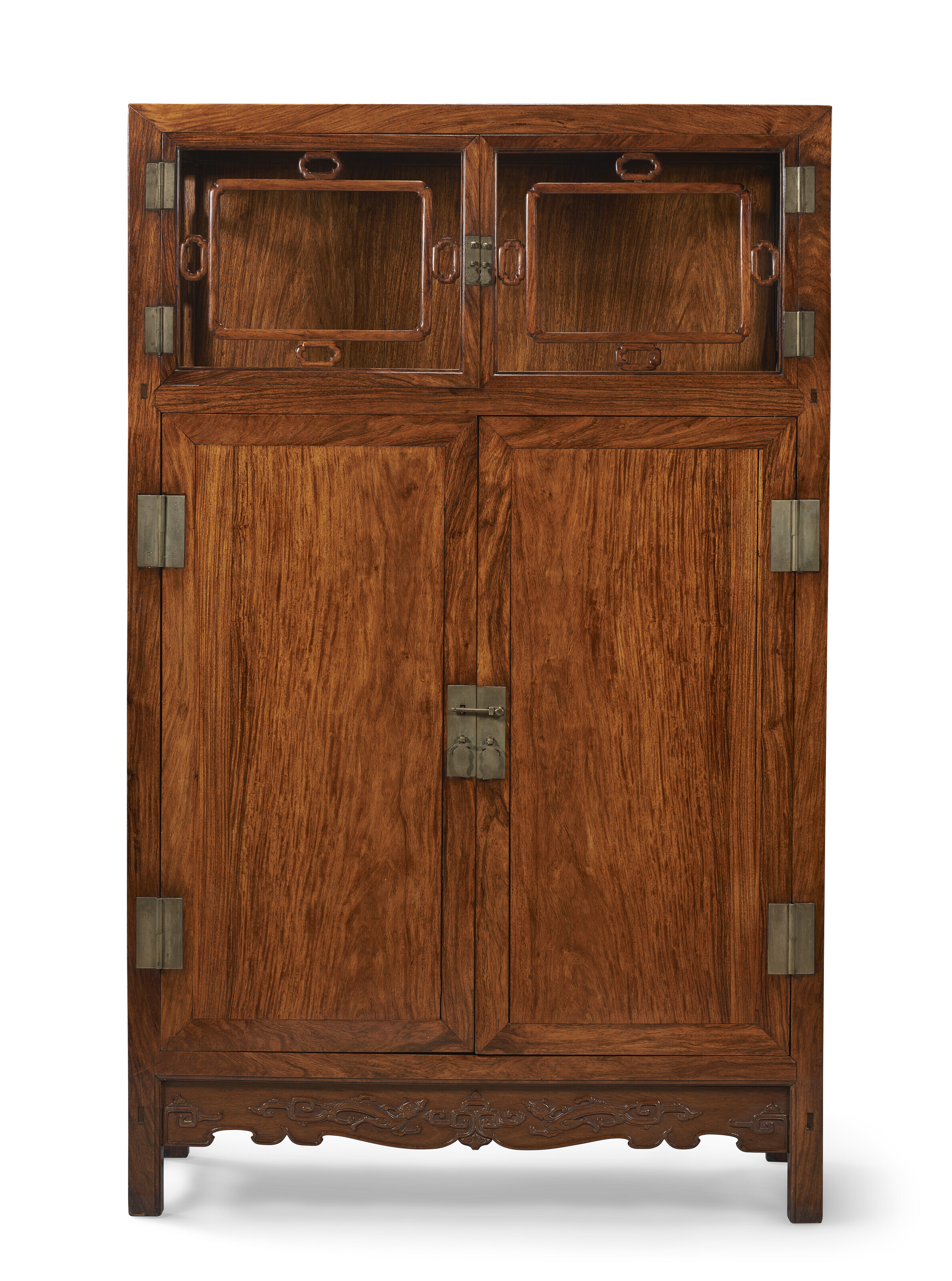 A huanghuali display cabinet, 18th-19th century. 61&frac34; in (156.8 cm) high; 38&frac34; in (98.4 cm), 19⅜ in (49.2 cm) deep. Estimate: $60,000-$80,000. Offered in Important Chinese Ceramics and Works of Art on 21-22 September 2023 at Christie&rsquo;s New York