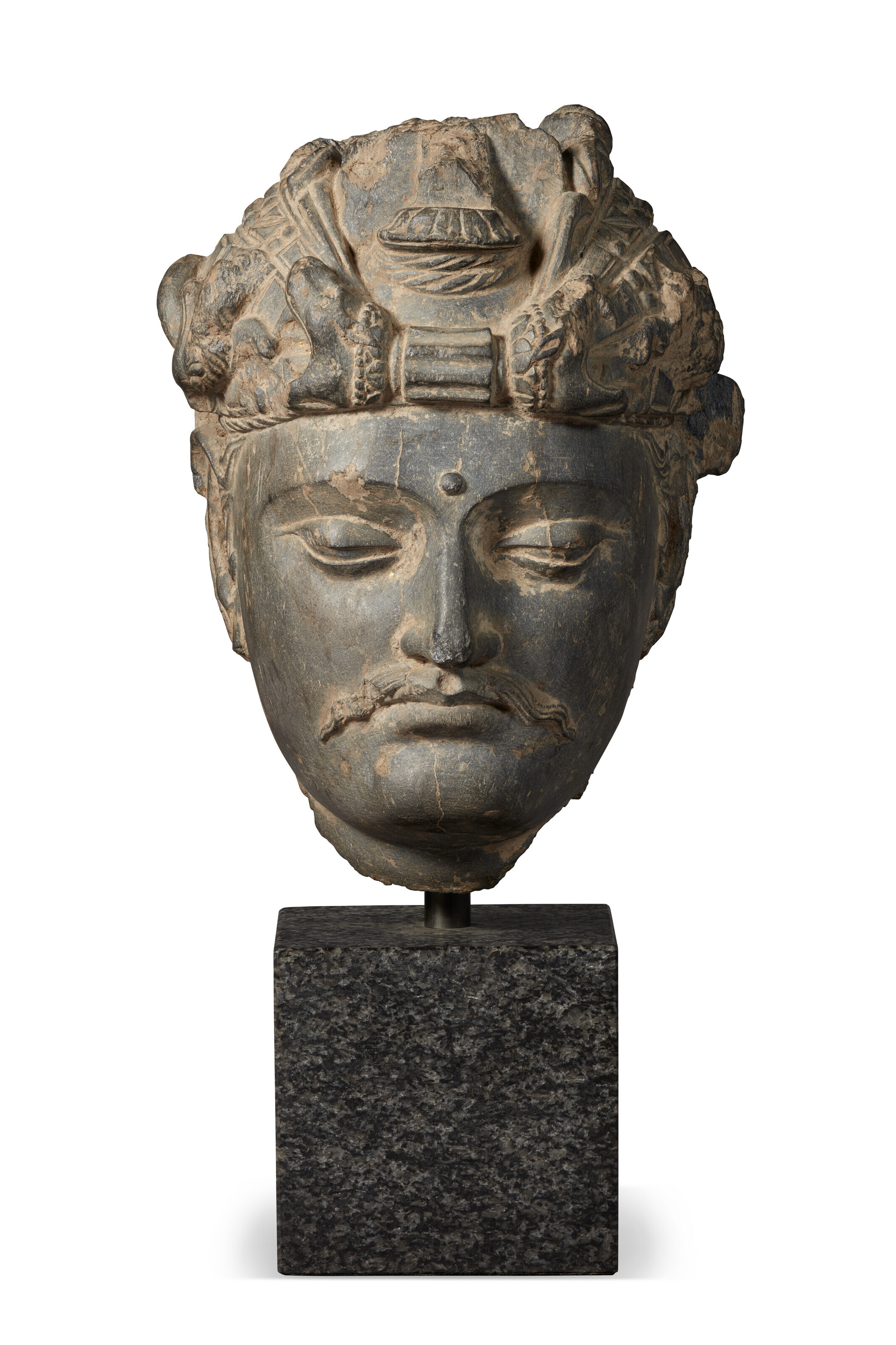 A GREY SCHIST HEAD OF A BODHISATTVA, ANCIENT REGION OF GANDHARA, 3RD ...