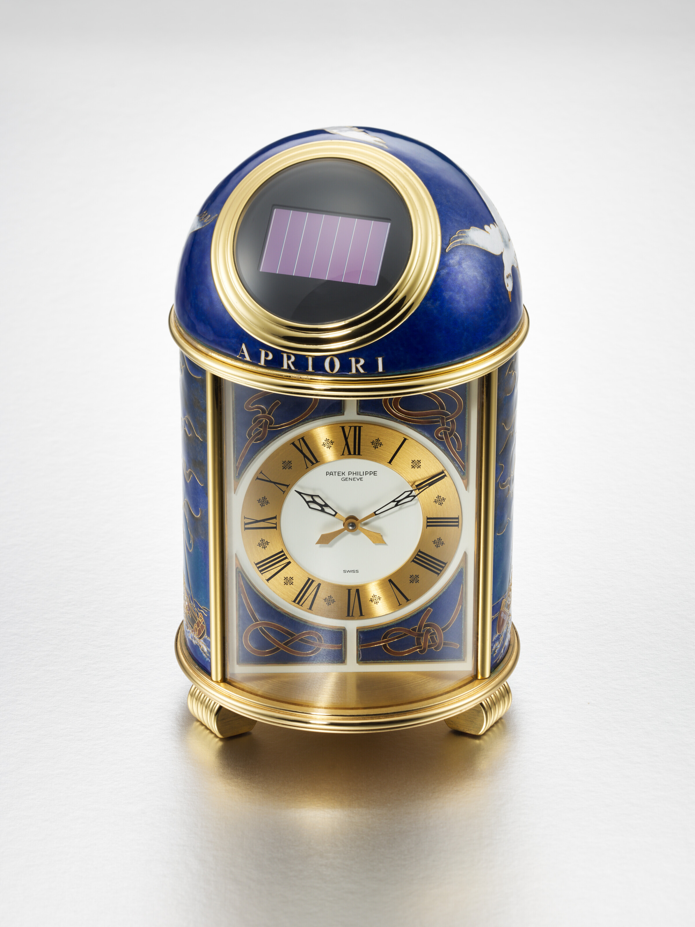 PATEK PHILIPPE. A UNIQUE AND HIGHLY ATTRACTIVE GILDED BRASS