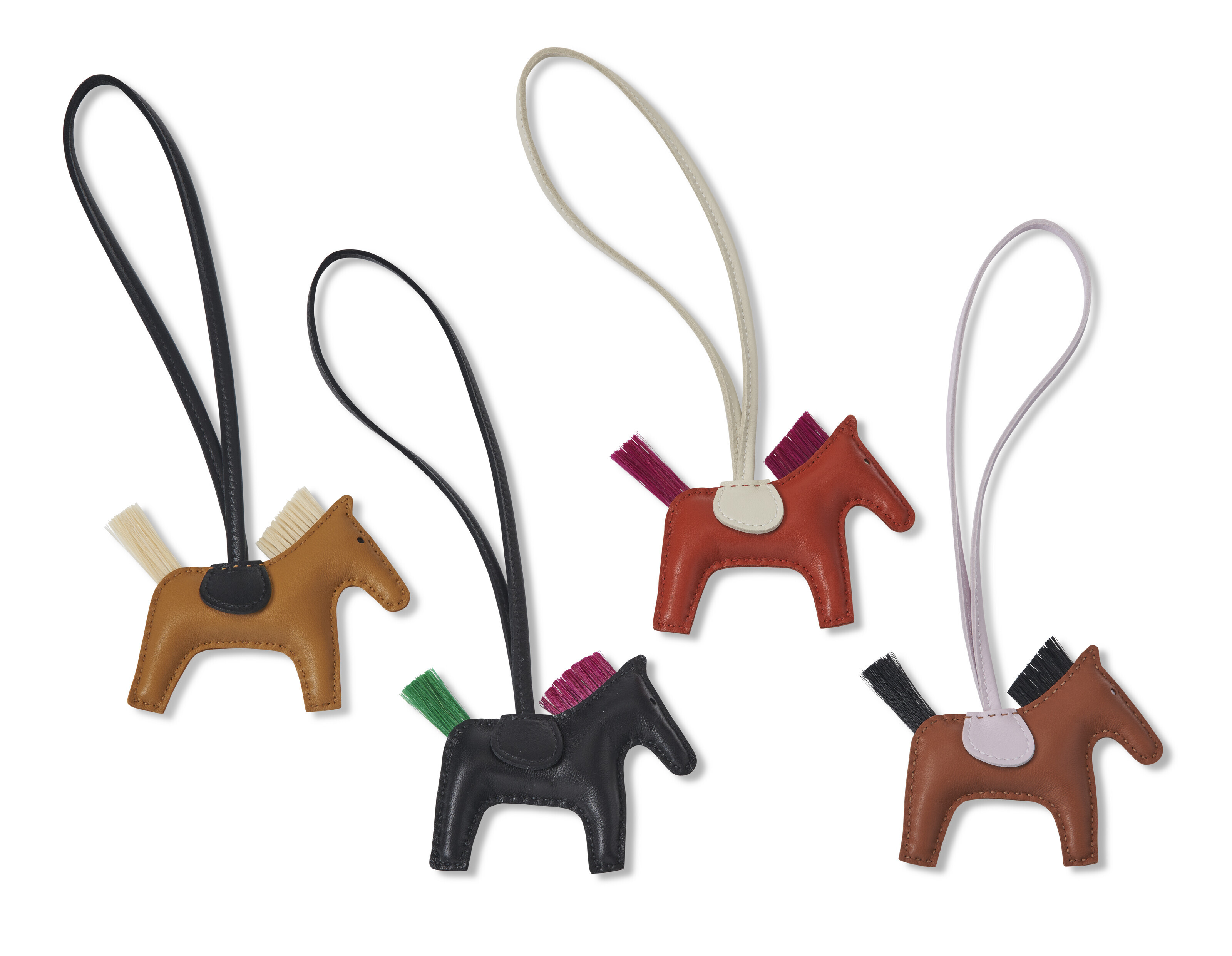 A SET OF FOUR: HORSEHAIR GRIGRI RODEO CHARMS, HERMÈS, 2023