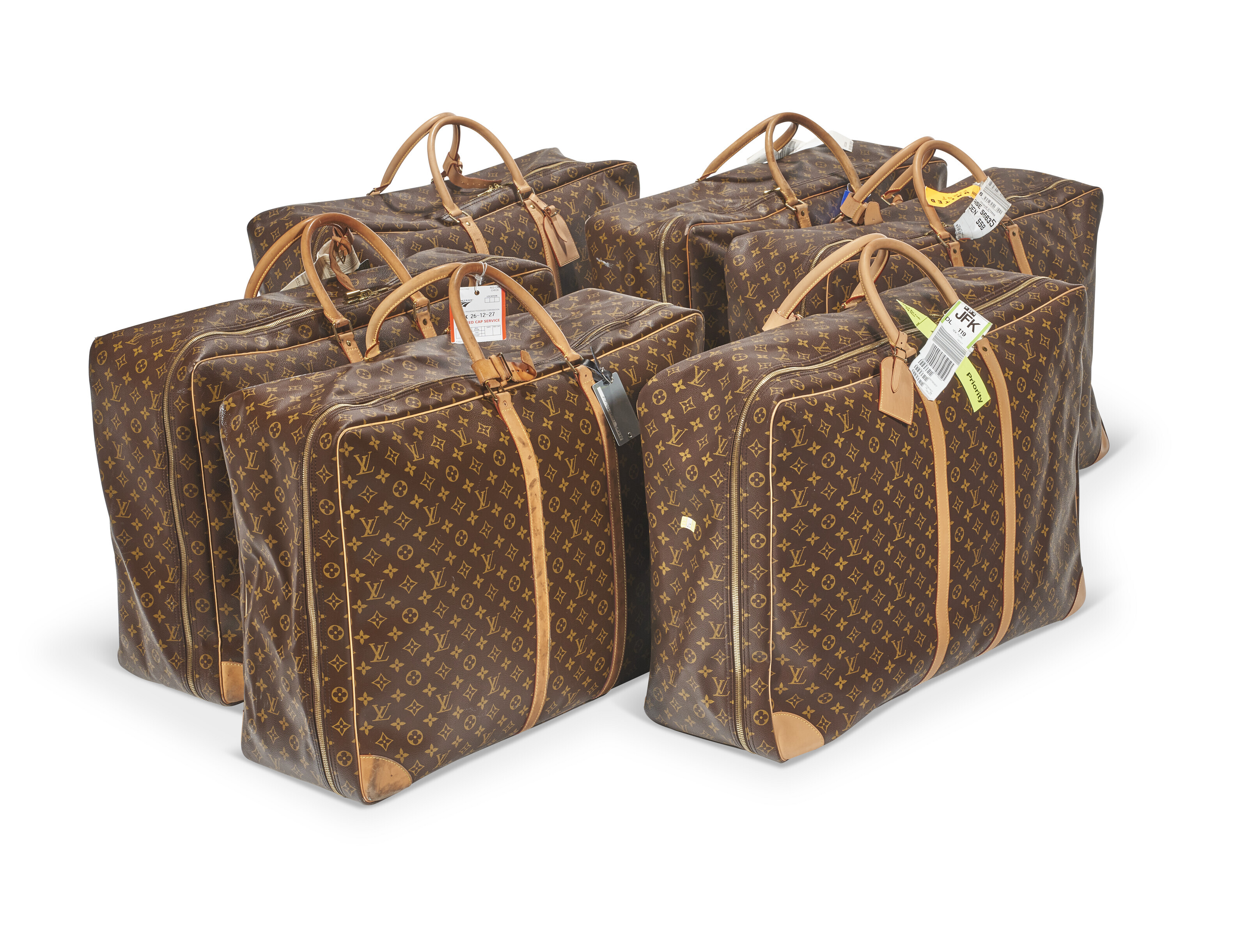 A SET OF SIX BROWN MONOGRAM CANVAS SIRIUS 70 BAGS