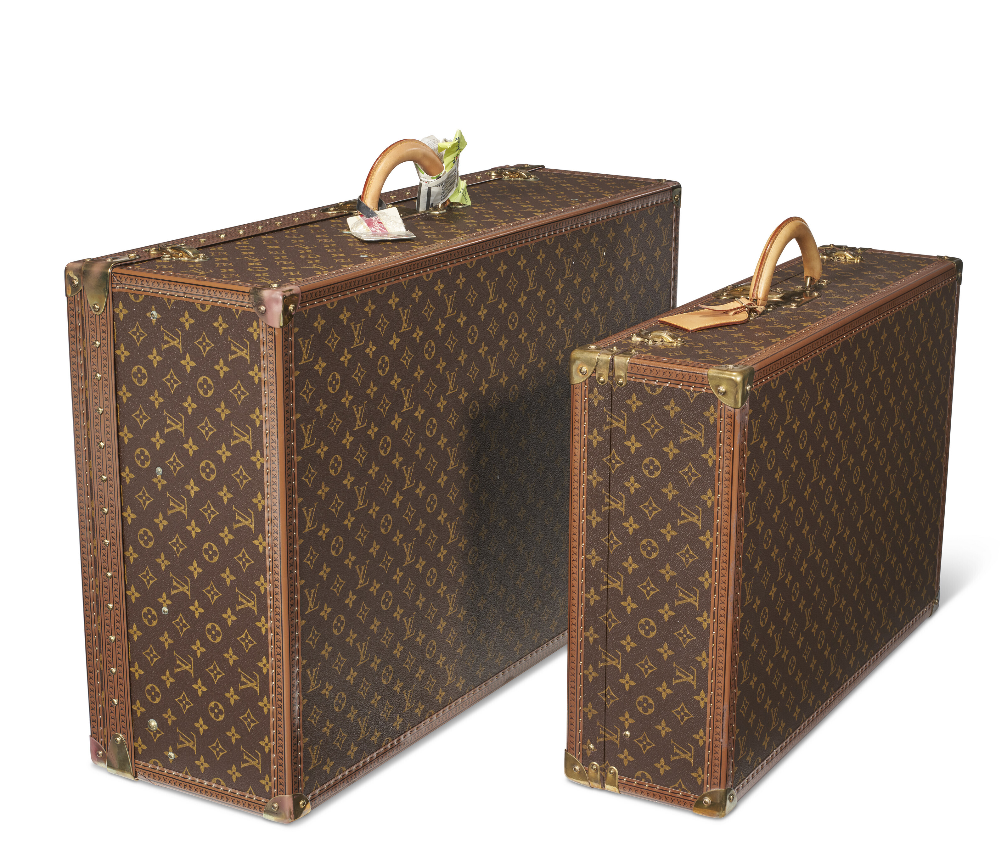 A PAIR OF BROWN MONOGRAM CANVAS HARDSIDED SUITCASES