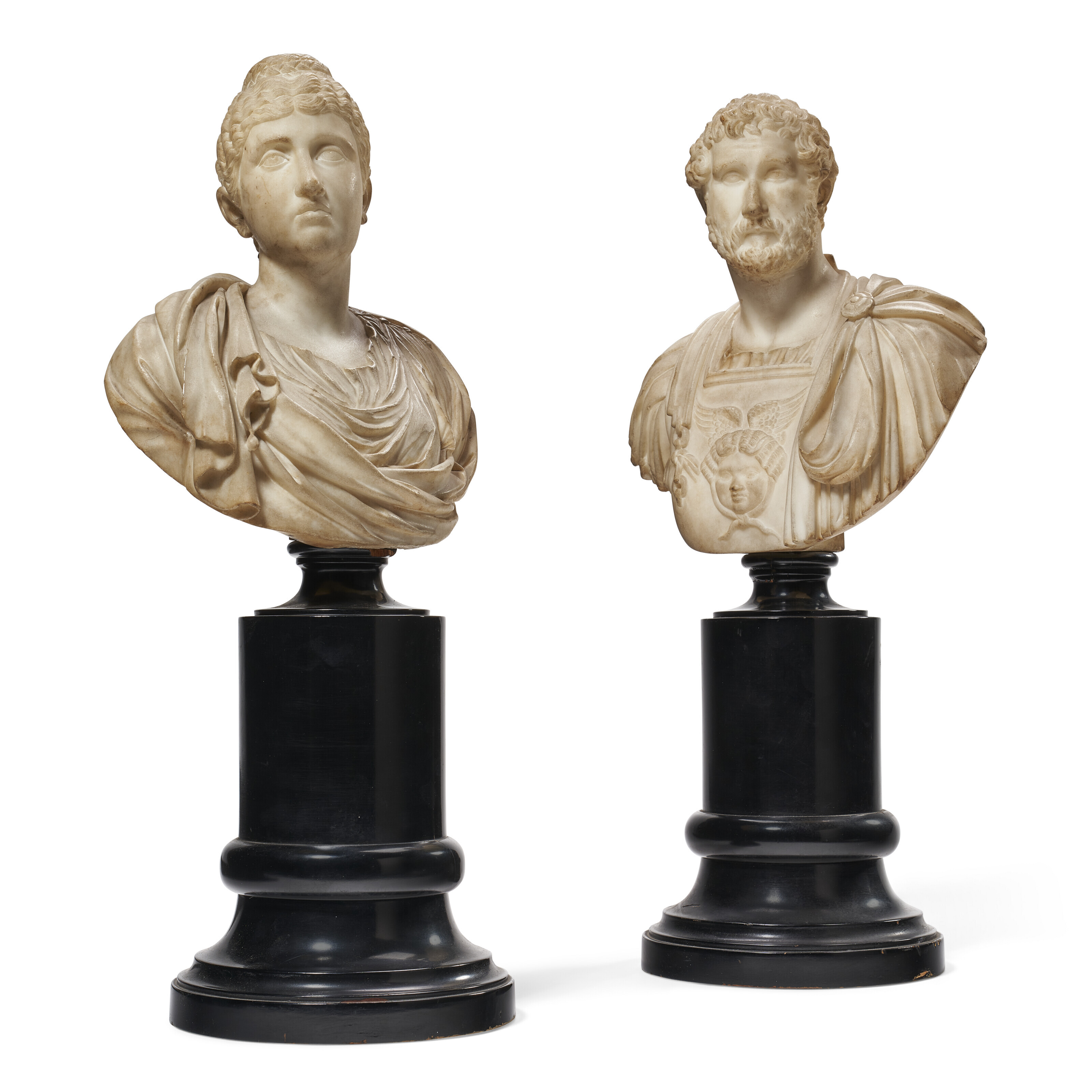 A PAIR OF ITALIAN WHITE MARBLE BUSTS OF VIBIA SABINA AND EMPEROR