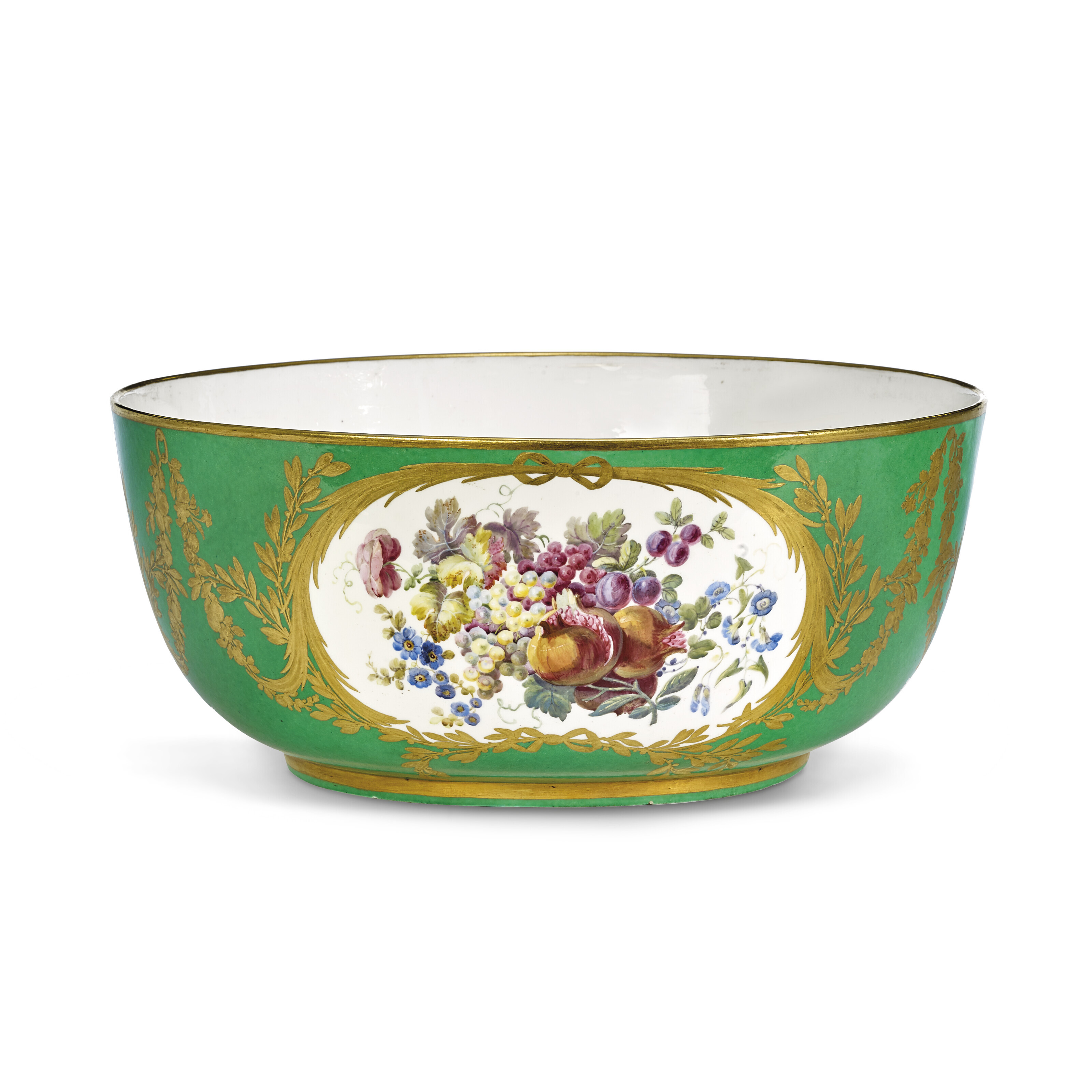 A SEVRES PORCELAIN GREEN-GROUND PART DINNER SERVICE, CIRCA 1777