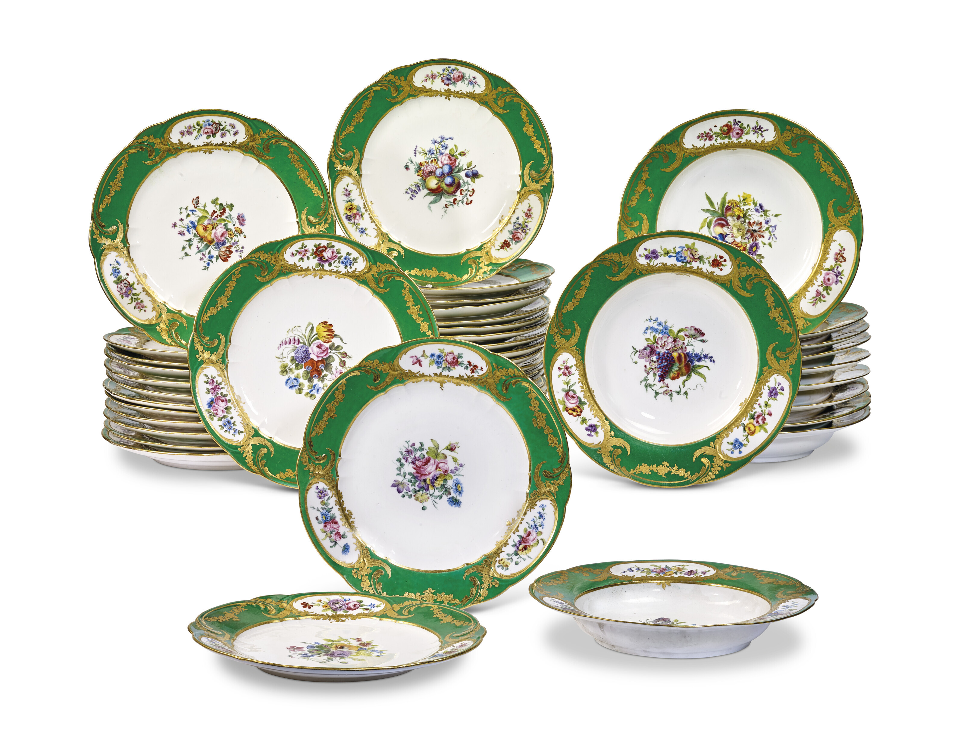 A SEVRES PORCELAIN GREEN-GROUND PART DINNER SERVICE, CIRCA 1777