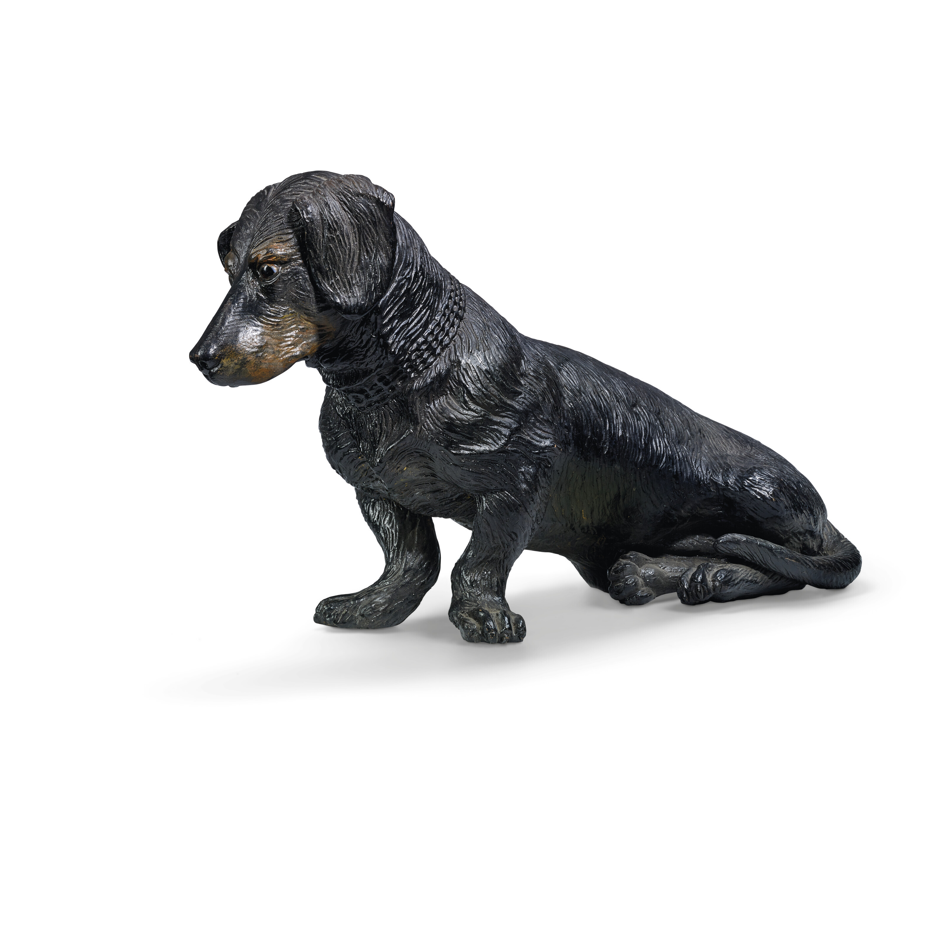 A POLYCHROME TERRACOTTA MODEL OF A DACHSHUND, 20TH CENTURY