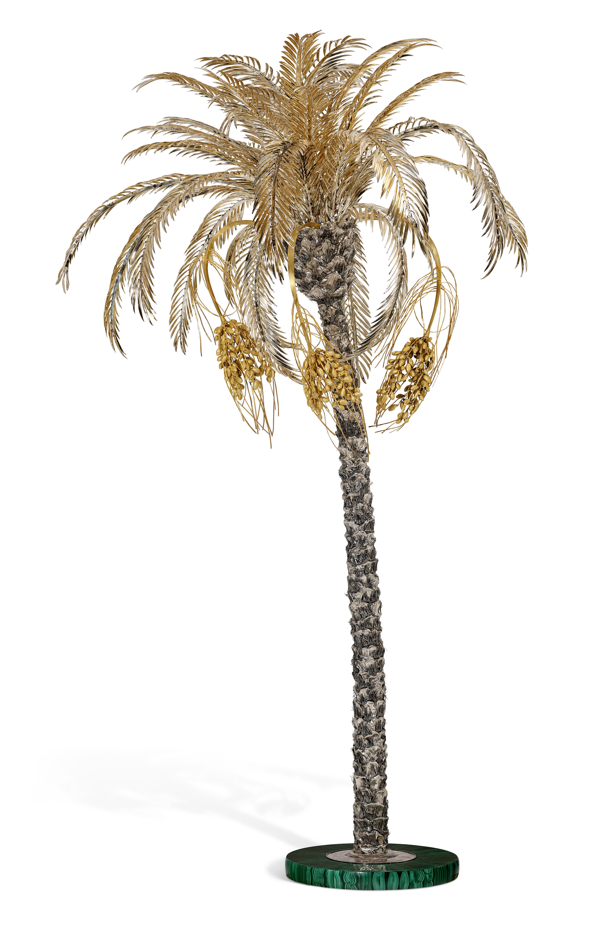 A life-size Italian parcel-gilt silver illuminated palm tree. Mark of Mazzucato, Milan, second half of 20th century. 10 ft. (304.8 cm.) high, approx. Sold for $60,480 in Sculptural Silver and Works of Art from the Orange Blossom Collection on 6 April 2023 at Christie's online