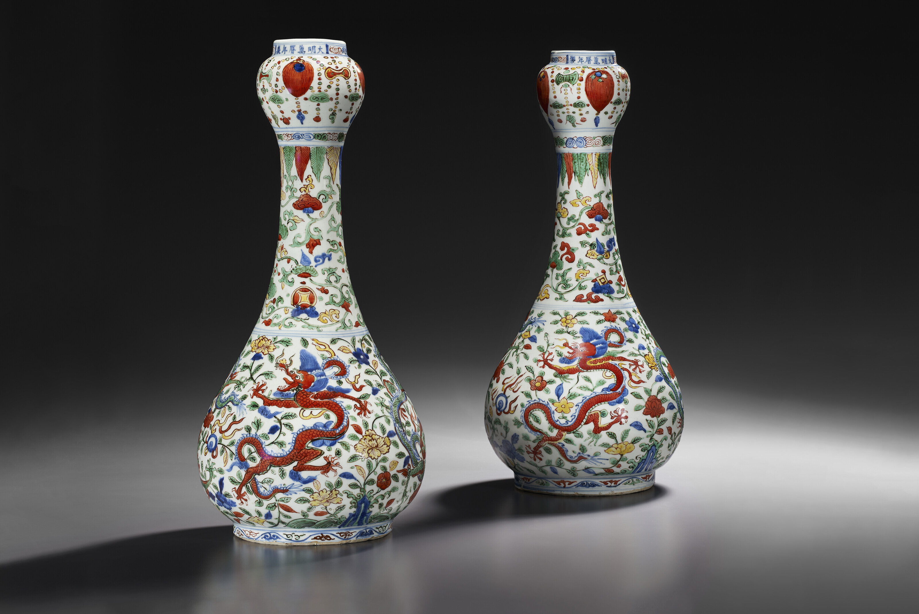 AN EXCEPTIONAL PAIR OF LARGE WUCAI 'GARLIC-MOUTH' VASES