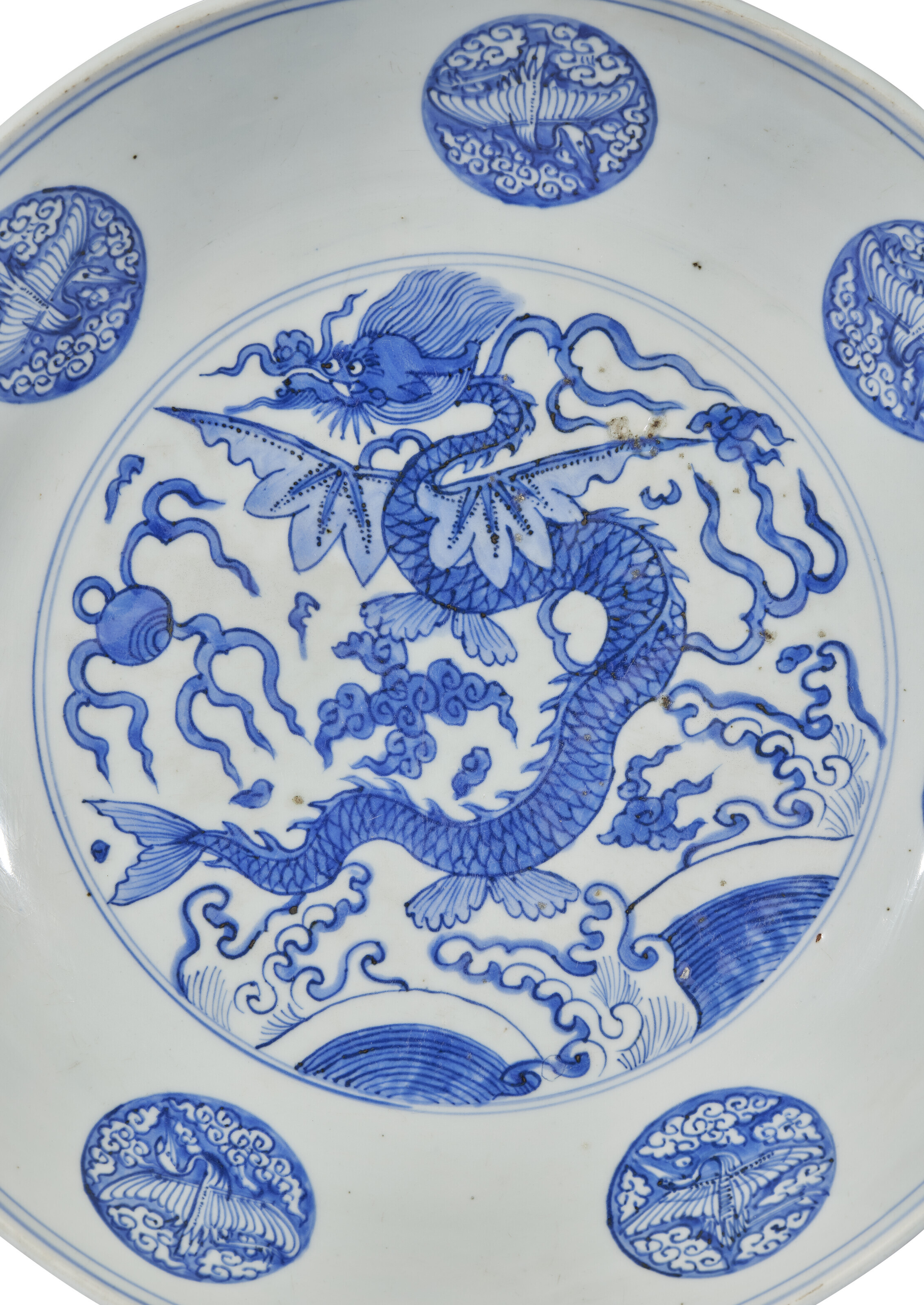 A BLUE AND WHITE 'WINGED DRAGON' DISH, CHINA, MING DYNASTY