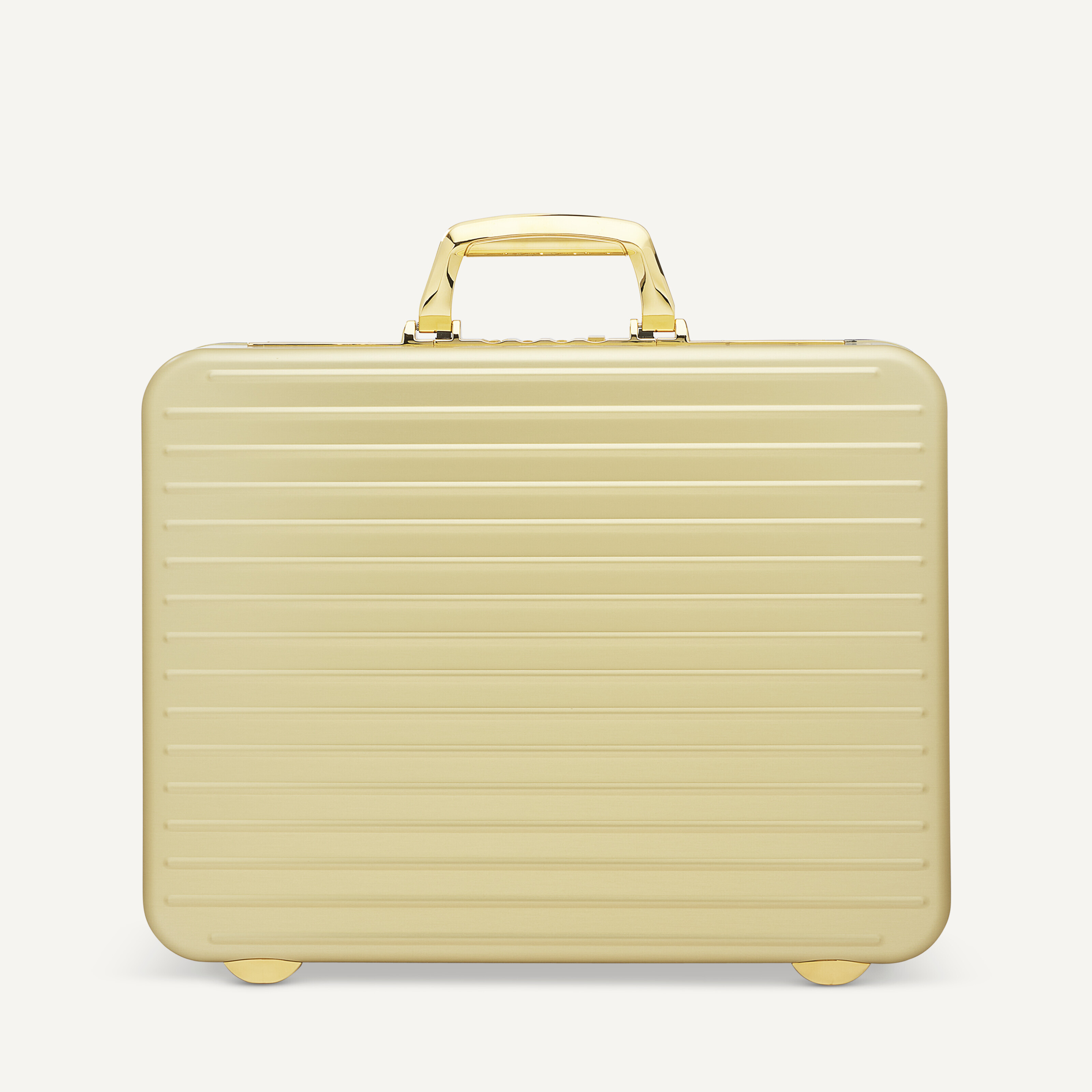 A LIMITED EDITION GOLD ALUMINIUM ATTACHÉ BRIEFCASE WITH GOLD