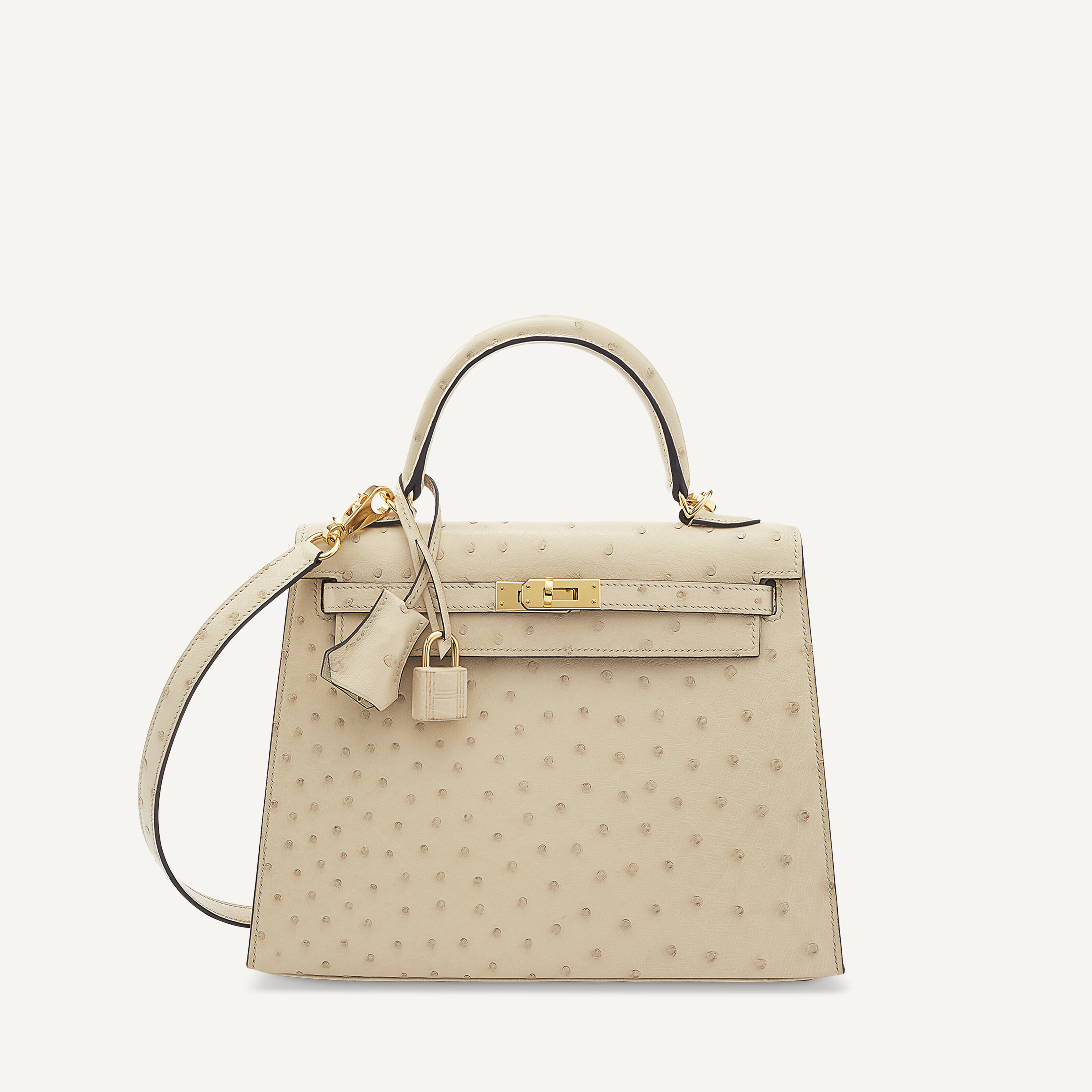 A PARCHEMIN OSTRICH SELLIER KELLY 25 WITH GOLD HARDWARE, HERMÈS