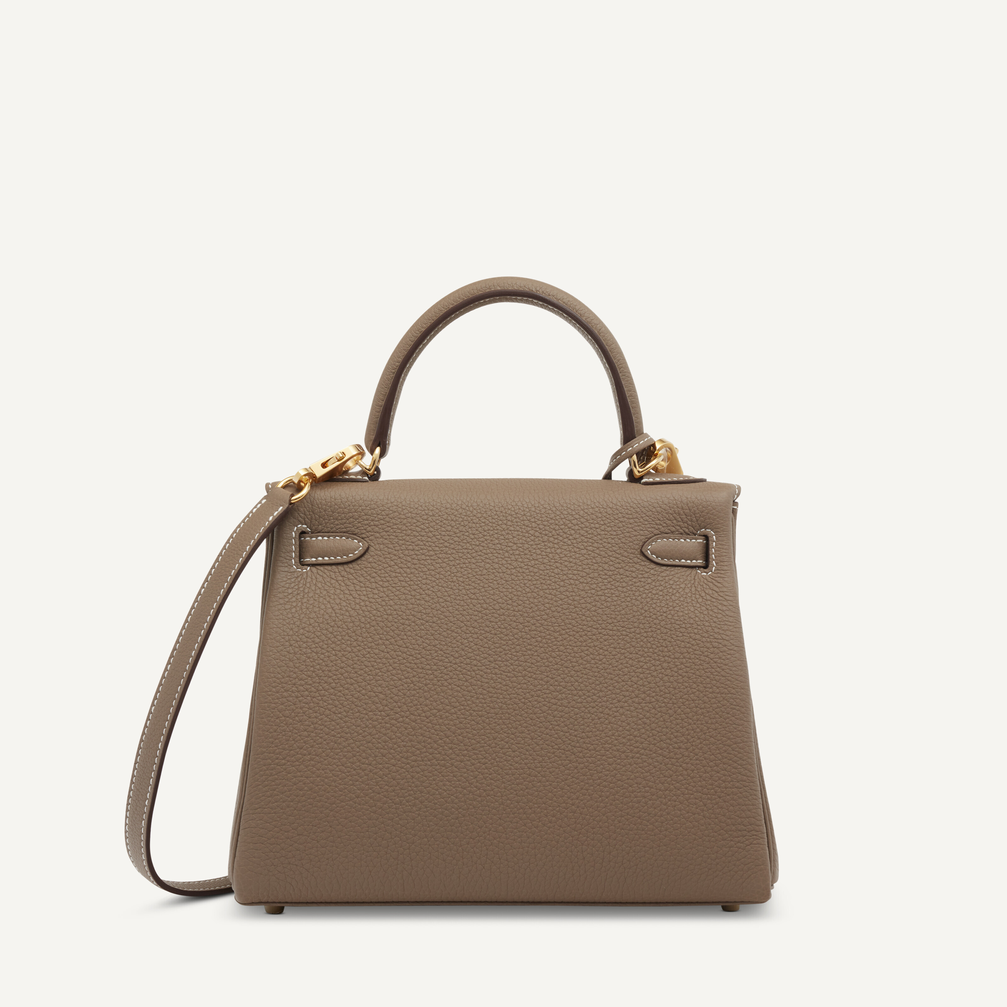 AN ÉTOUPE TOGO LEATHER RETOURNÉ KELLY 25 WITH GOLD HARDWARE