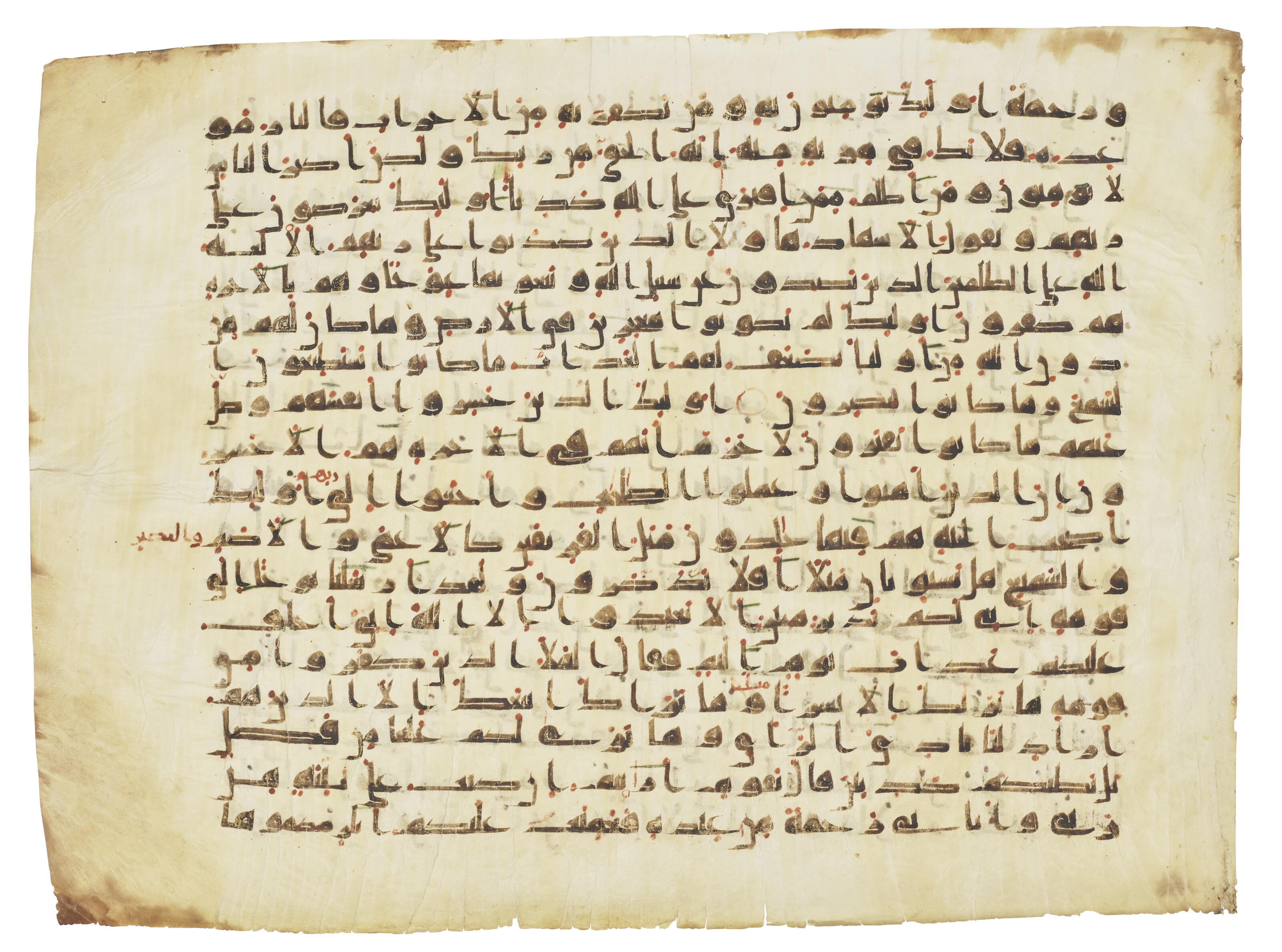 A MONUMENTAL KUFIC QUR'AN FOLIO, NEAR EAST OR NORTH AFRICA, 9TH/10TH CENTURY