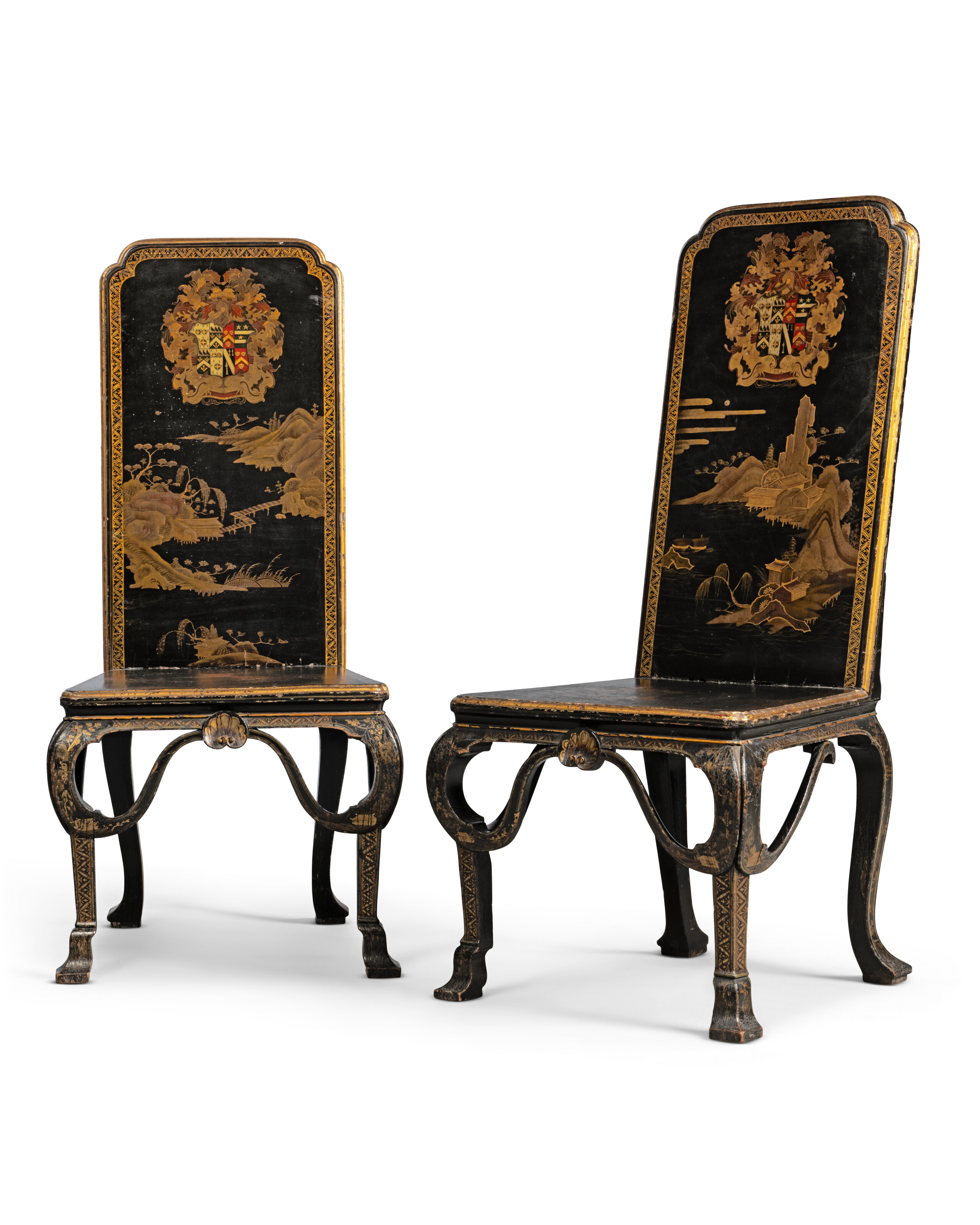 A pair of George I black, red and gilt Chinese lacquer and japanned hall chairs, circa 1720, sold for £81,900 on 2 July 2024 at Christie's in London