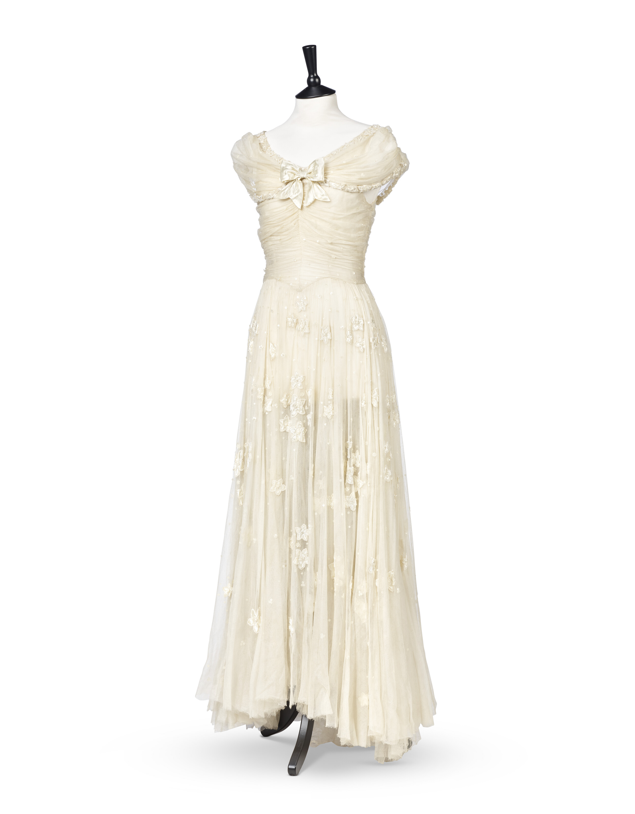 A royal bridesmaid's dress and headdress, by Norman Hartnell, 1947, the embroidery designed by Flora Ballard, offered in The Exceptional Sale on 2 July 2024 at Christie's in London