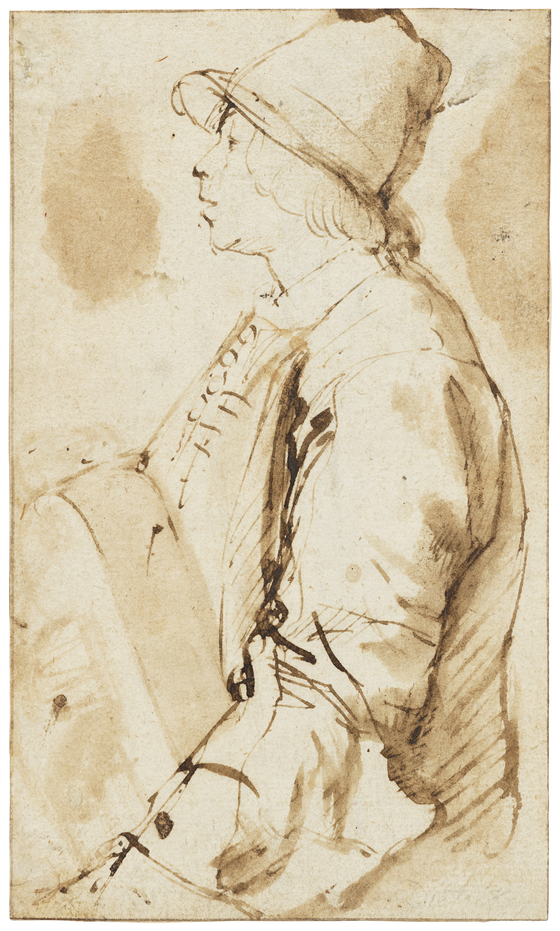 A young hurdy-gurdy player in profile