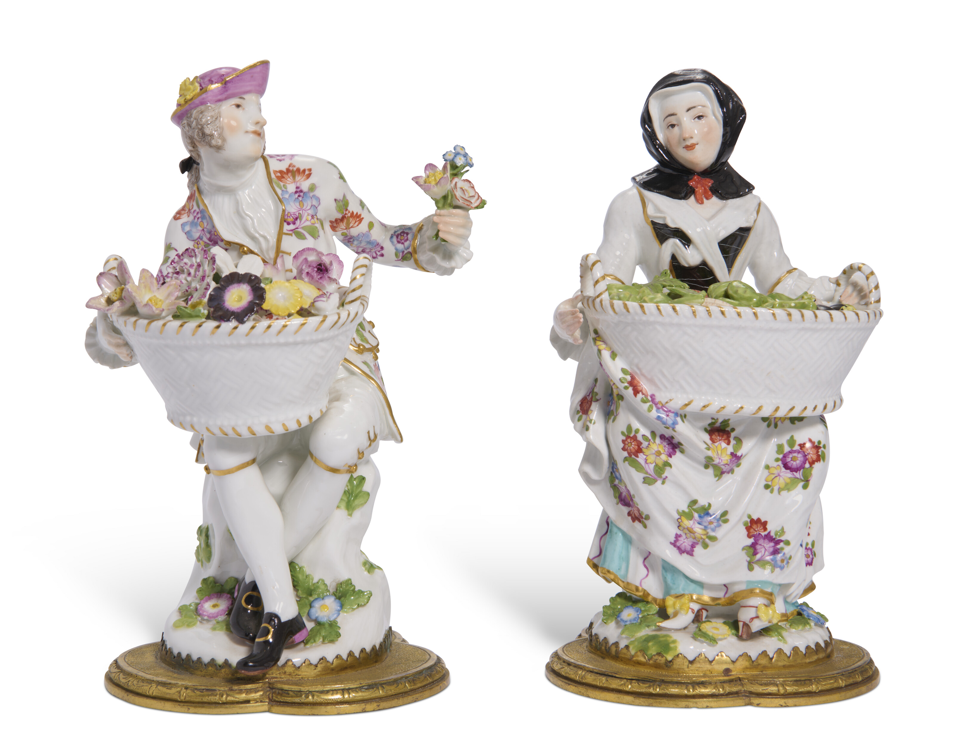 A MEISSEN PORCELAIN FIGURE OF A PEASANT WOMAN WITH A HEN, CIRCA