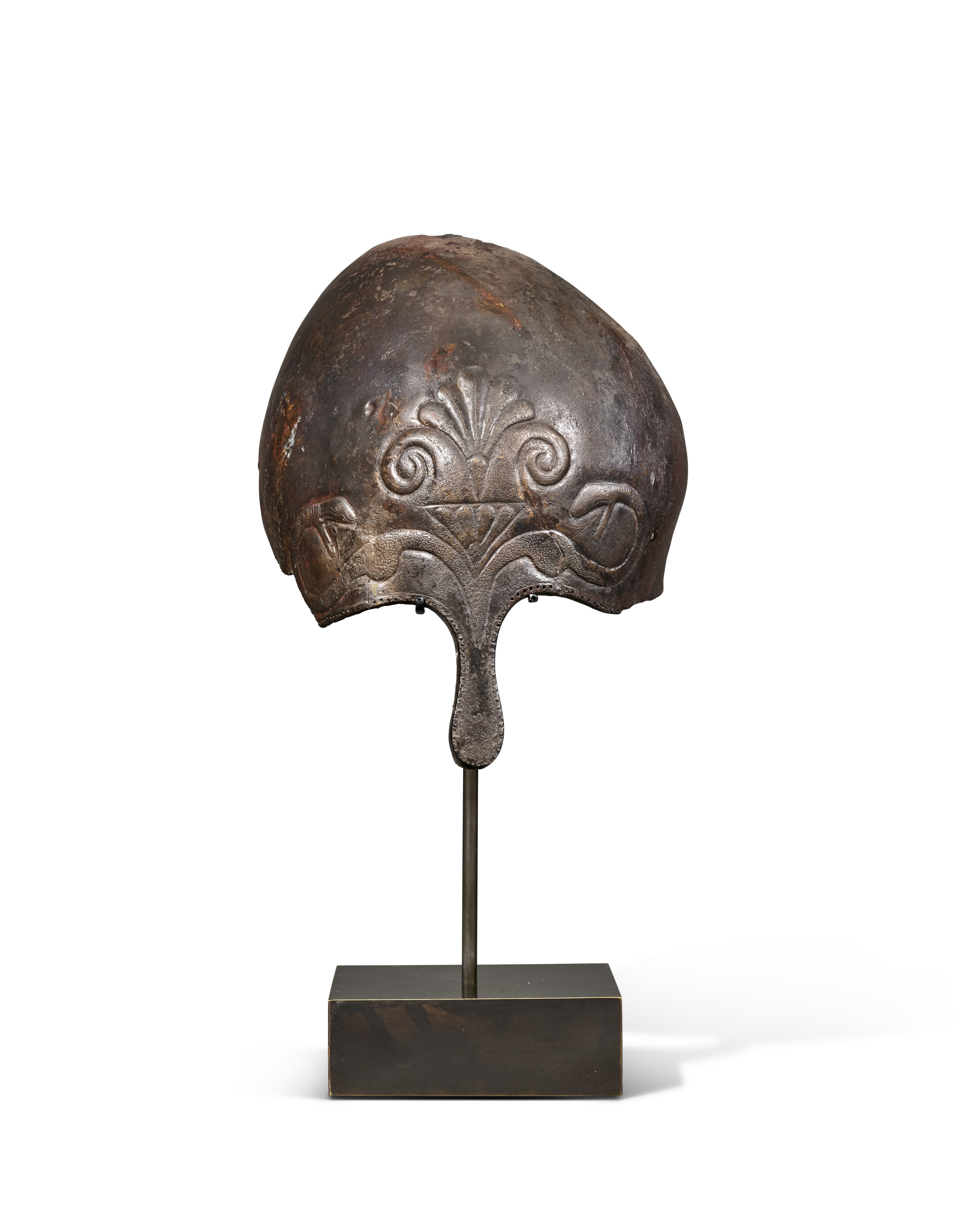 A Greek bronze Corinthian helmet fragment, Archaic to early Classical period, circa 550-500 BC, offered in Works of Art from the Mougins Museum of Classical Art, Online from 26 November to 10 December 2024 at Christie's Online