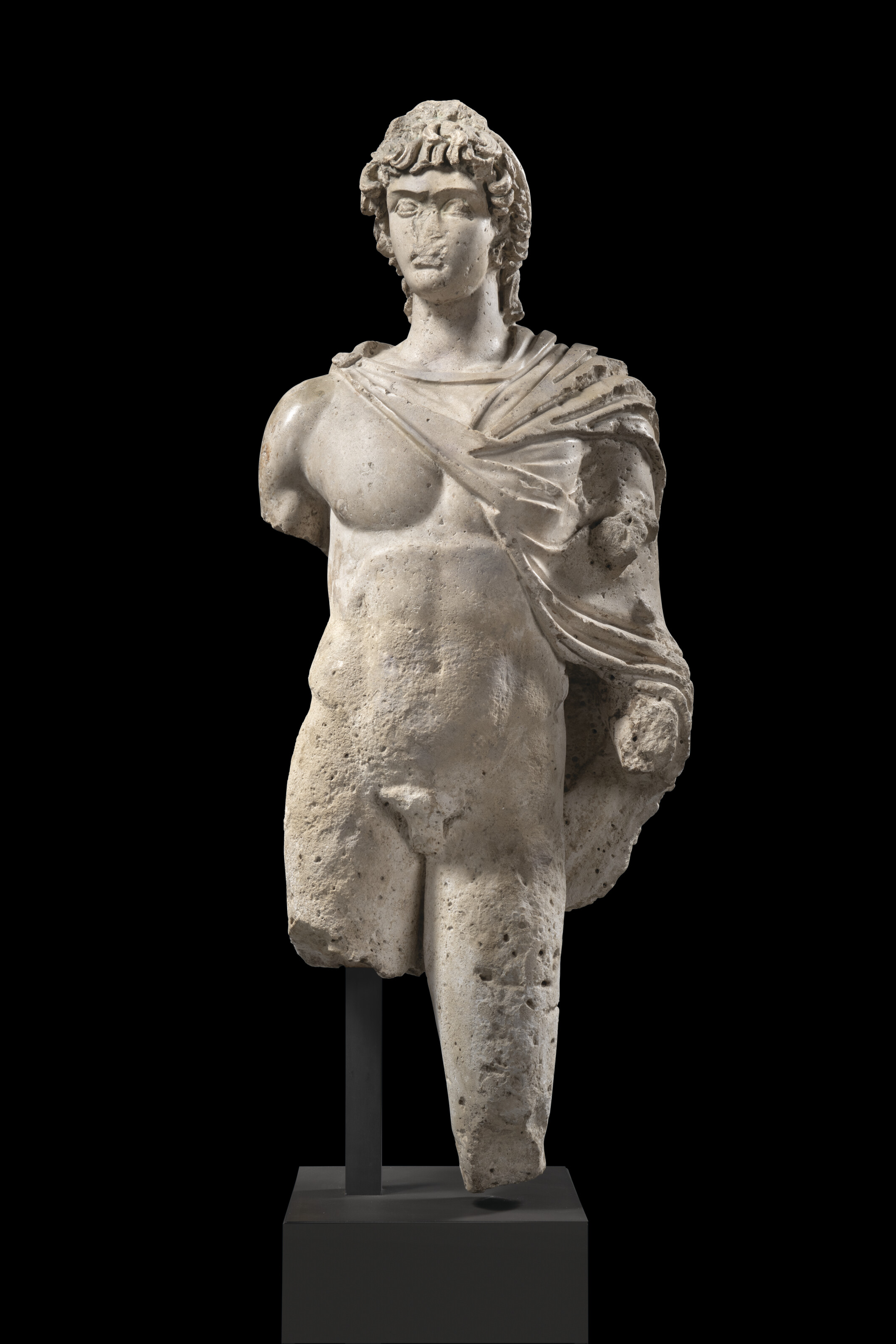 A Roman limestone figure of Antinous, reign of Hadrian, circa 130-138 AD, offered in Antiquities from the Mougins Museum of Classical Art on 4 December 2024 at Christie's in London