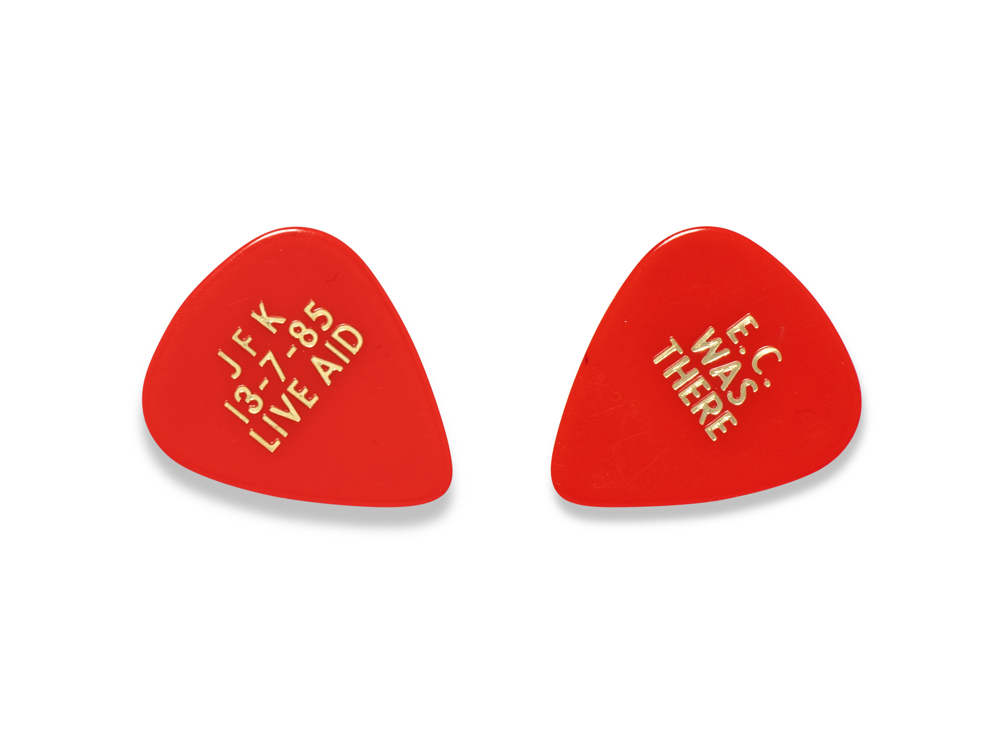 Eric Clapton at Live Aid, Two custom guitar picks, 1985 | Christie's