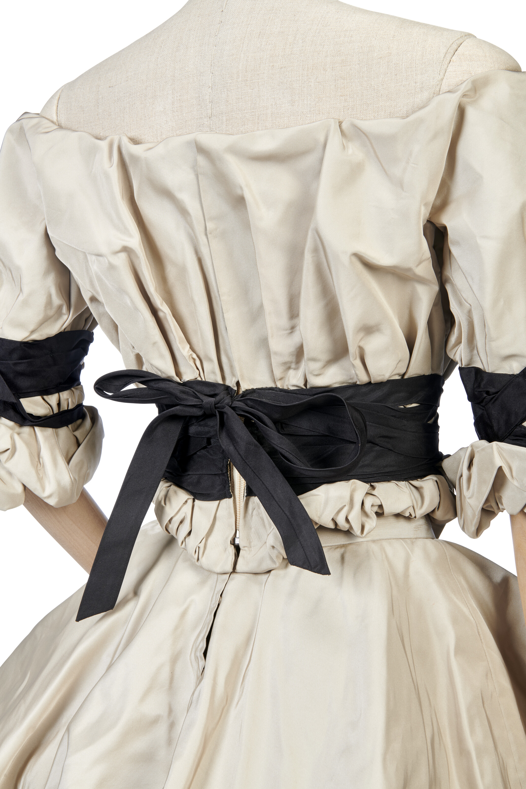 Vivienne Westwood, a corset gown of taupe silk taffeta from the Dressed to Scale Collection, Autumn-Winter 1998/99, offered in Vivienne Westwood: The Personal Collection - Part I on 25 June 2024 at Christie's in London