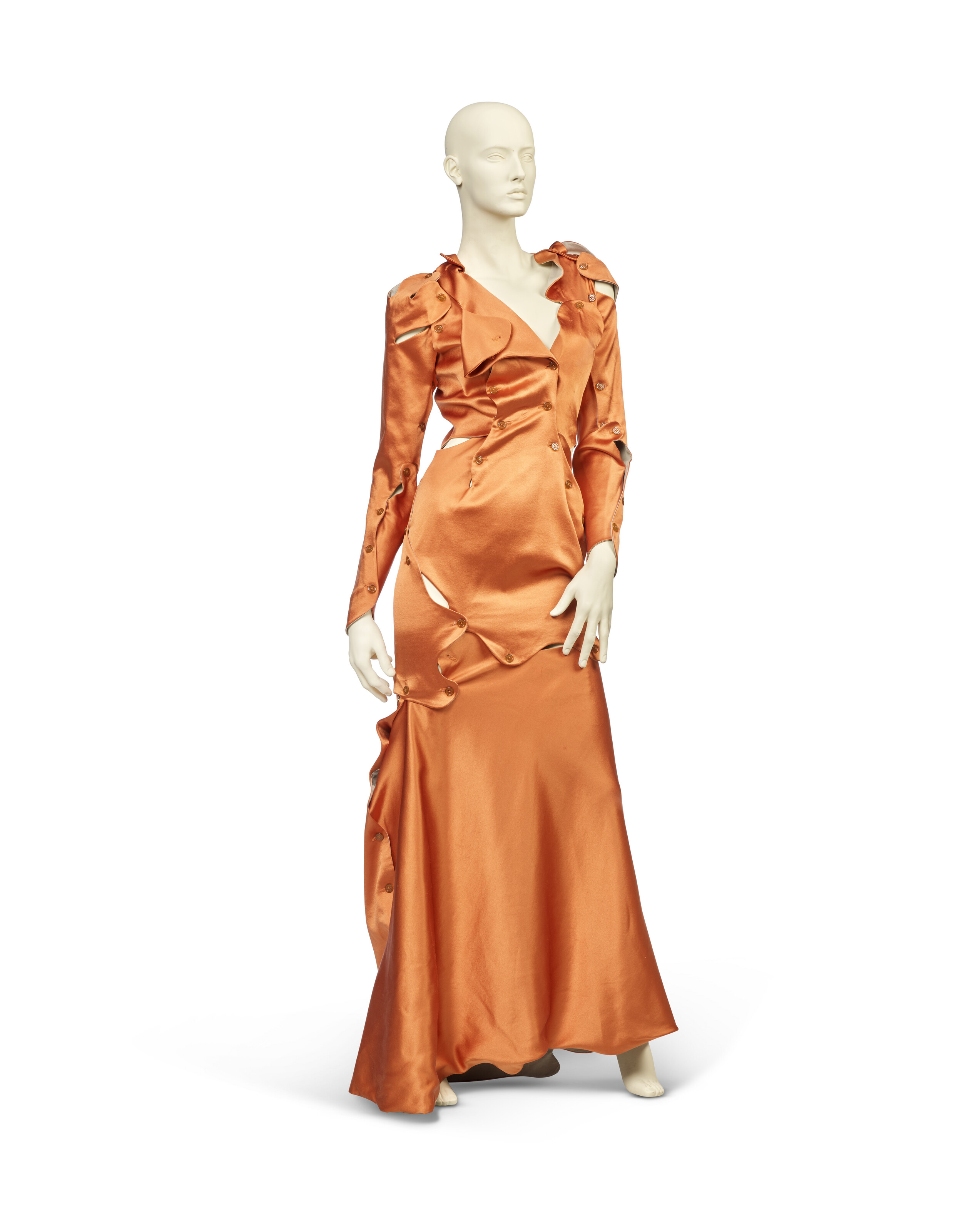 VIVIENNE WESTWOOD, 'WAKE UP CAVE GIRL' COLLECTION, AUTUMN-WINTER 2007 / 08,  AN ORANGE SATIN 'FLINTSTONE' DRESS AND CAPE | Christie's