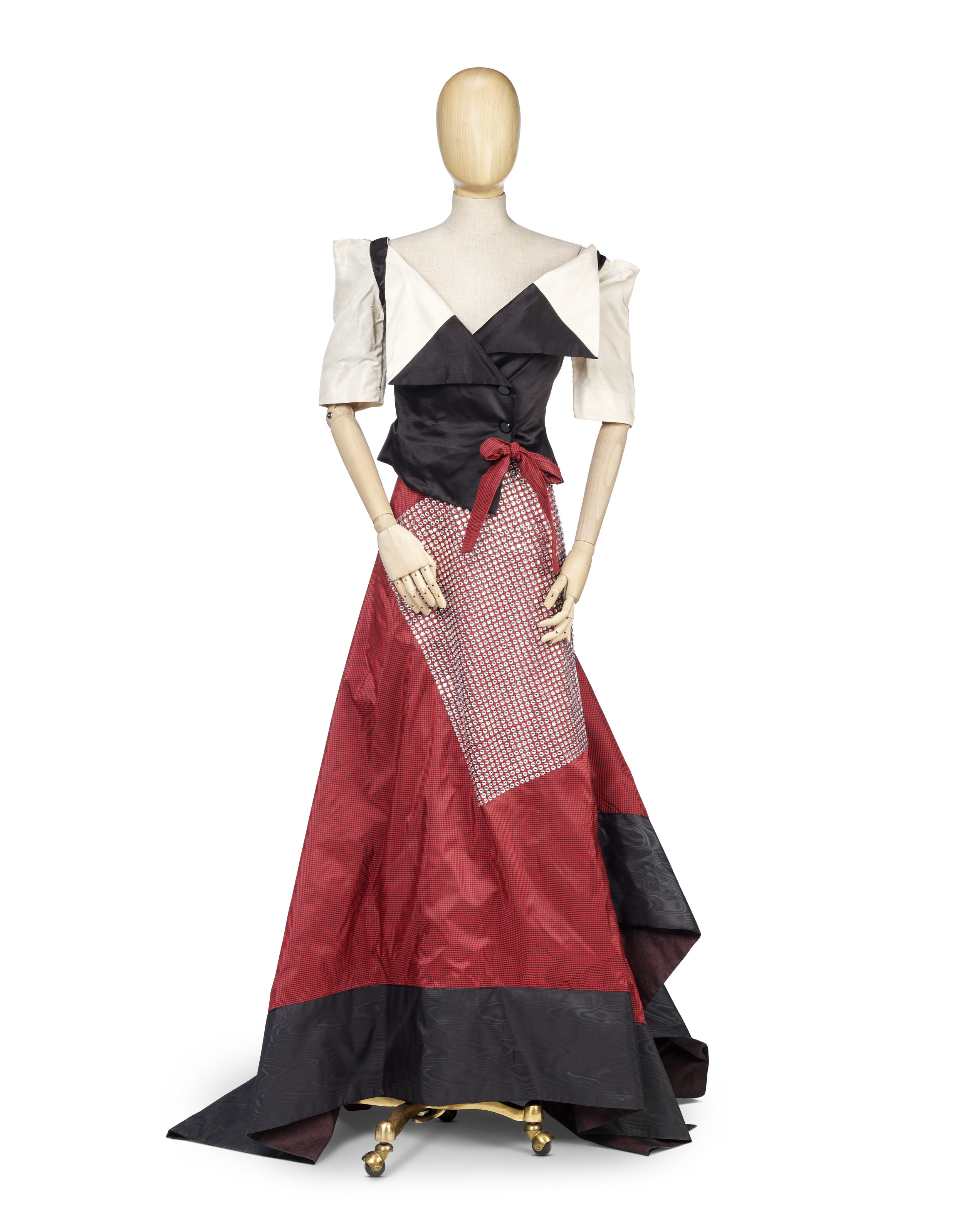 VIVIENNE WESTWOOD, 'DRESSED TO SCALE' COLLECTION, AUTUMN-WINTER 1998/99, A  PURPLE WOOL KNITTED DRESS WITH OUTSIZED 'ORB' BUTTONS | Christie's
