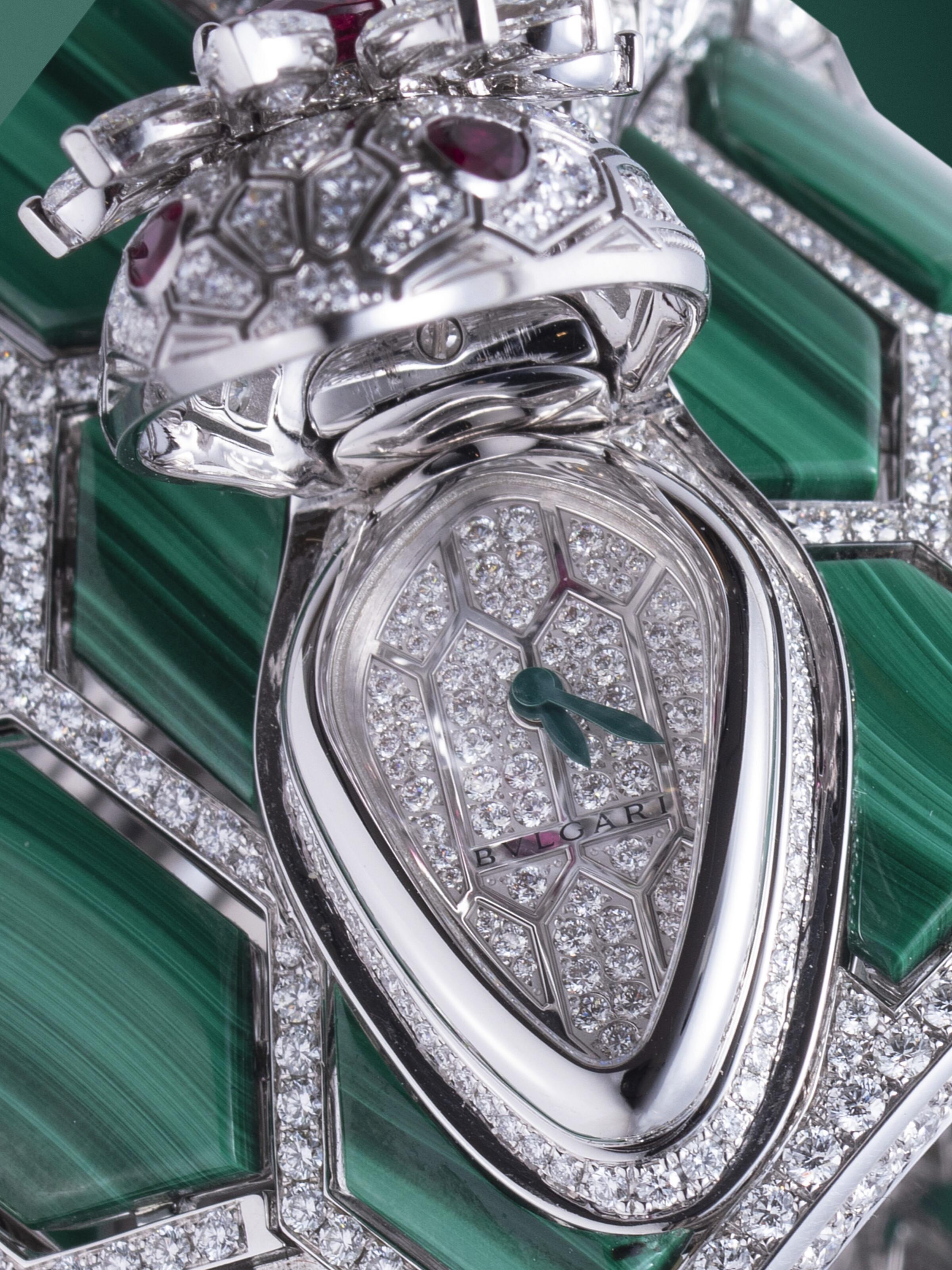 BULGARI, SERPENTI MISTERIOSI REF. 103164, A SPECTACULAR AND EXTREMELY RARE  GOLD, DIAMOND, MALACHITE AND RUBELLITE-SET SECRET CUFF WATCH, CASE NUMBER:  P00034 | Christie's