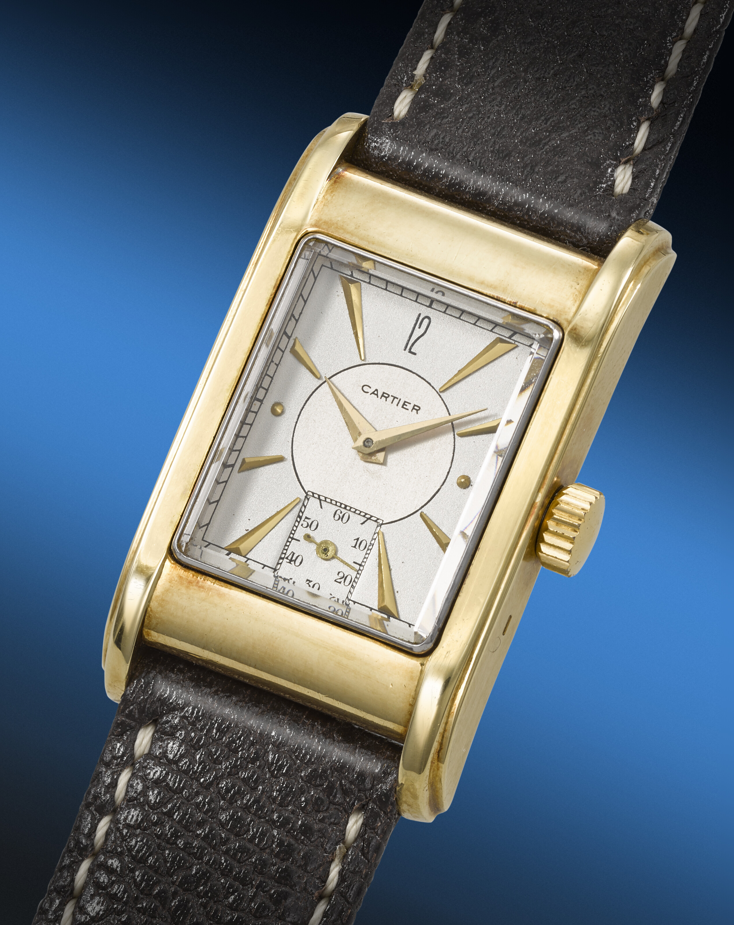 CARTIER. A RARE AND ATTRACTIVE 18K GOLD WRISTWATCH WITH TWO-TONE