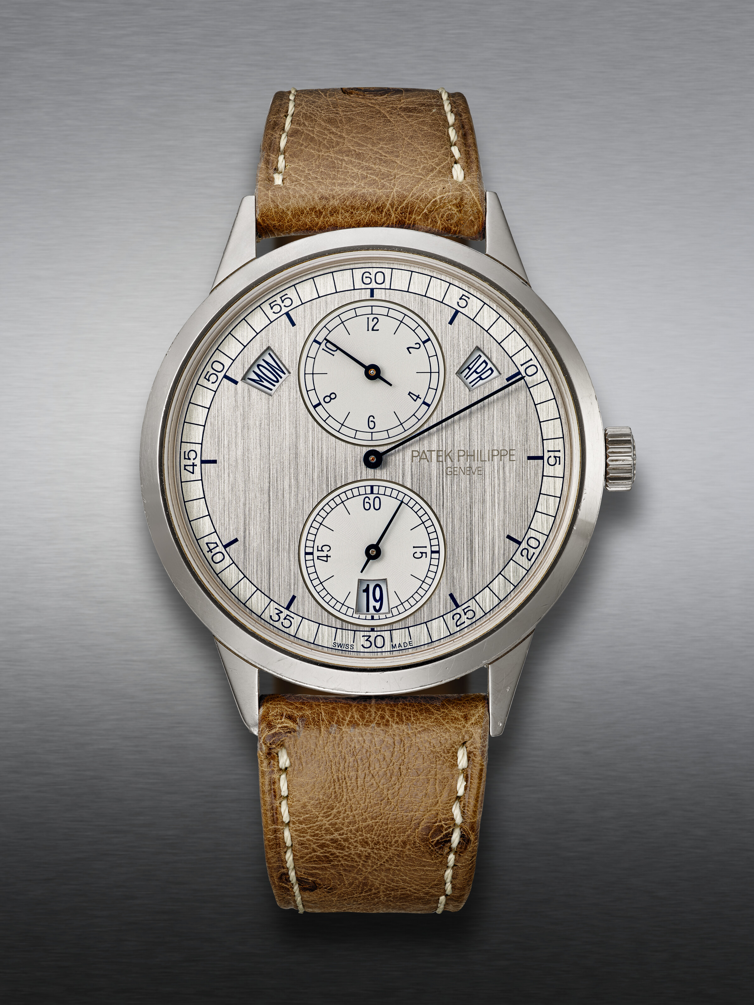 PATEK PHILIPPE, WHITE GOLD ANNUAL CALENDAR WRISTWATCH, WITH REGULATOR